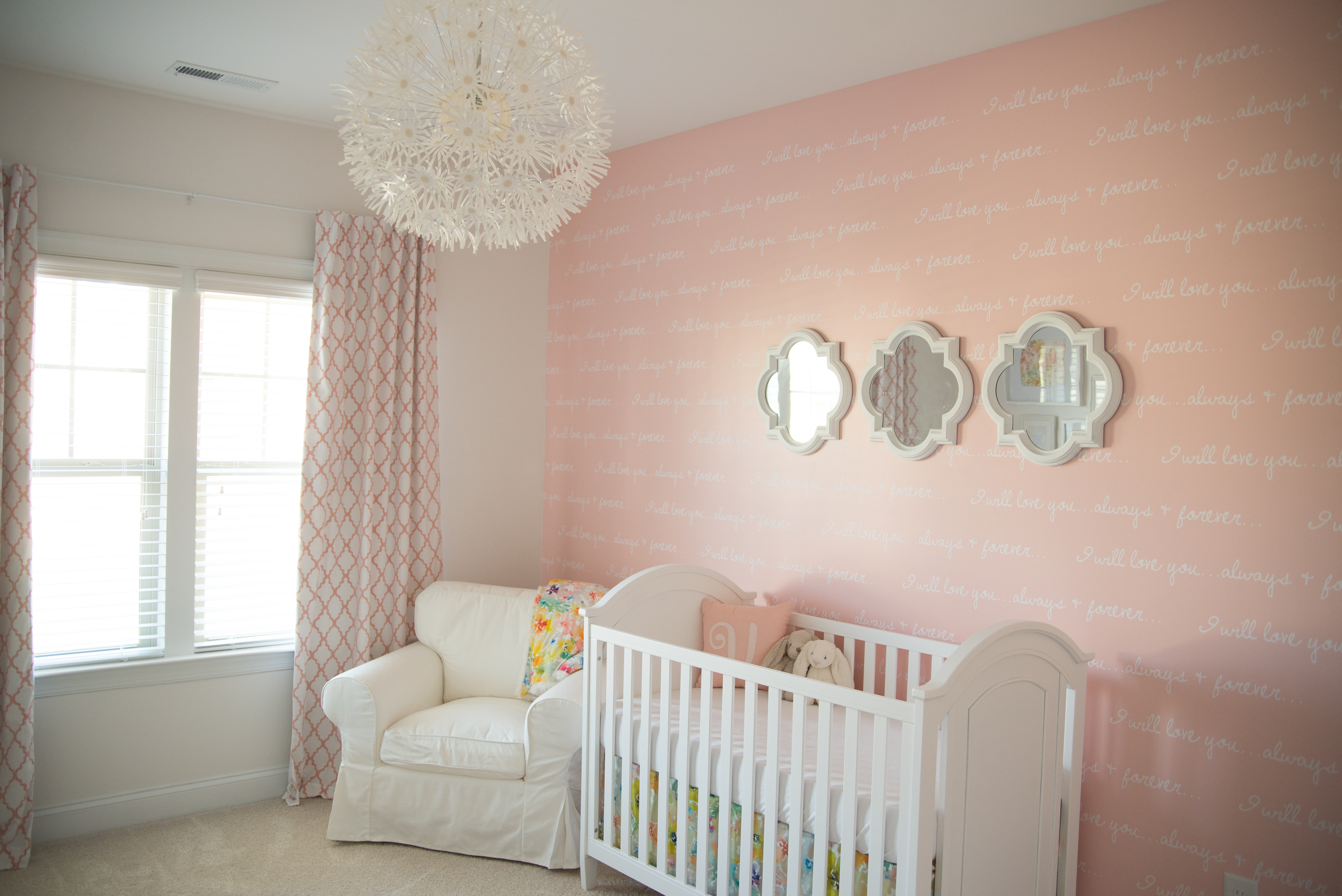 pink accent wall nursery