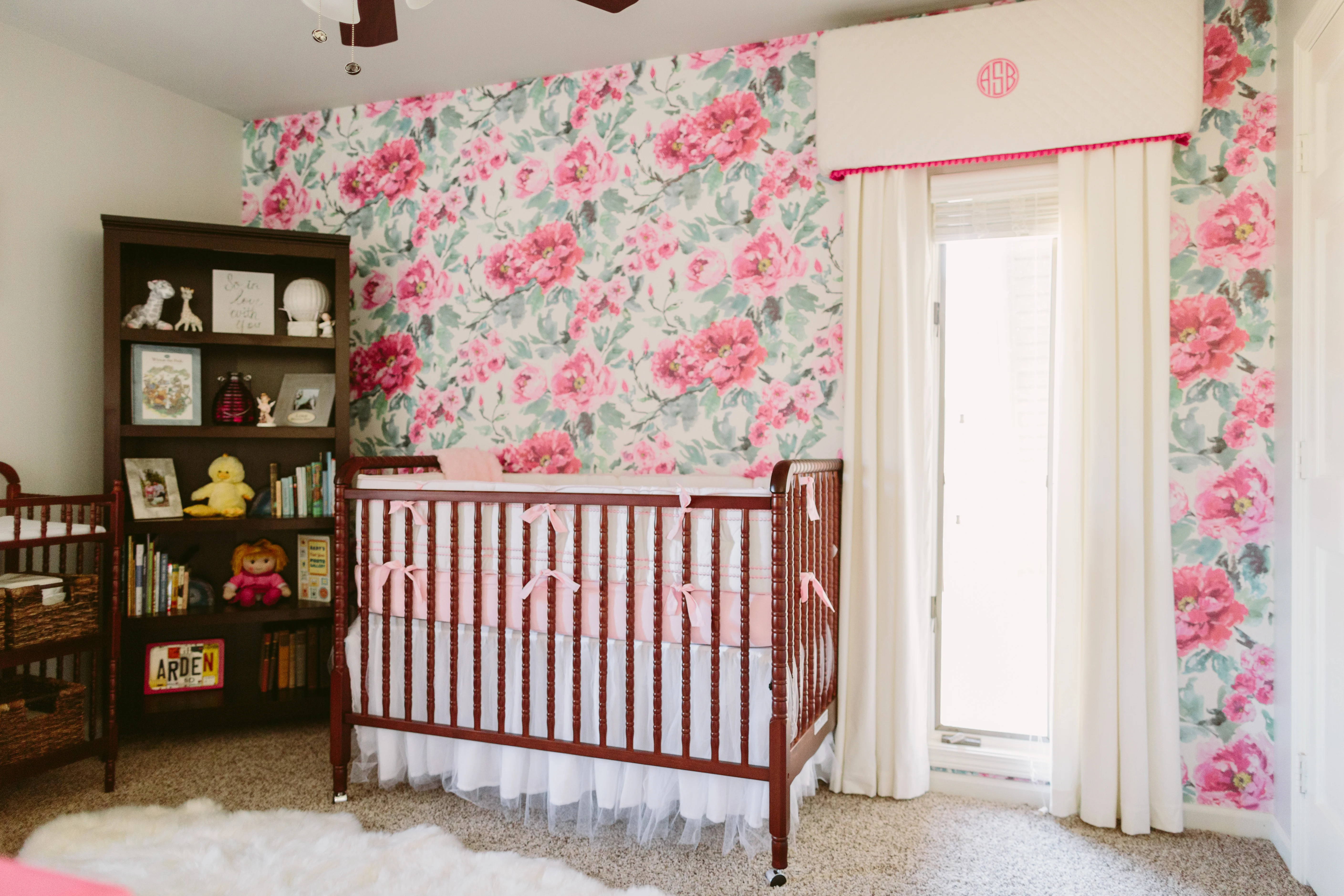 Bold Baby Girl Nursery with Floral Wallpaper