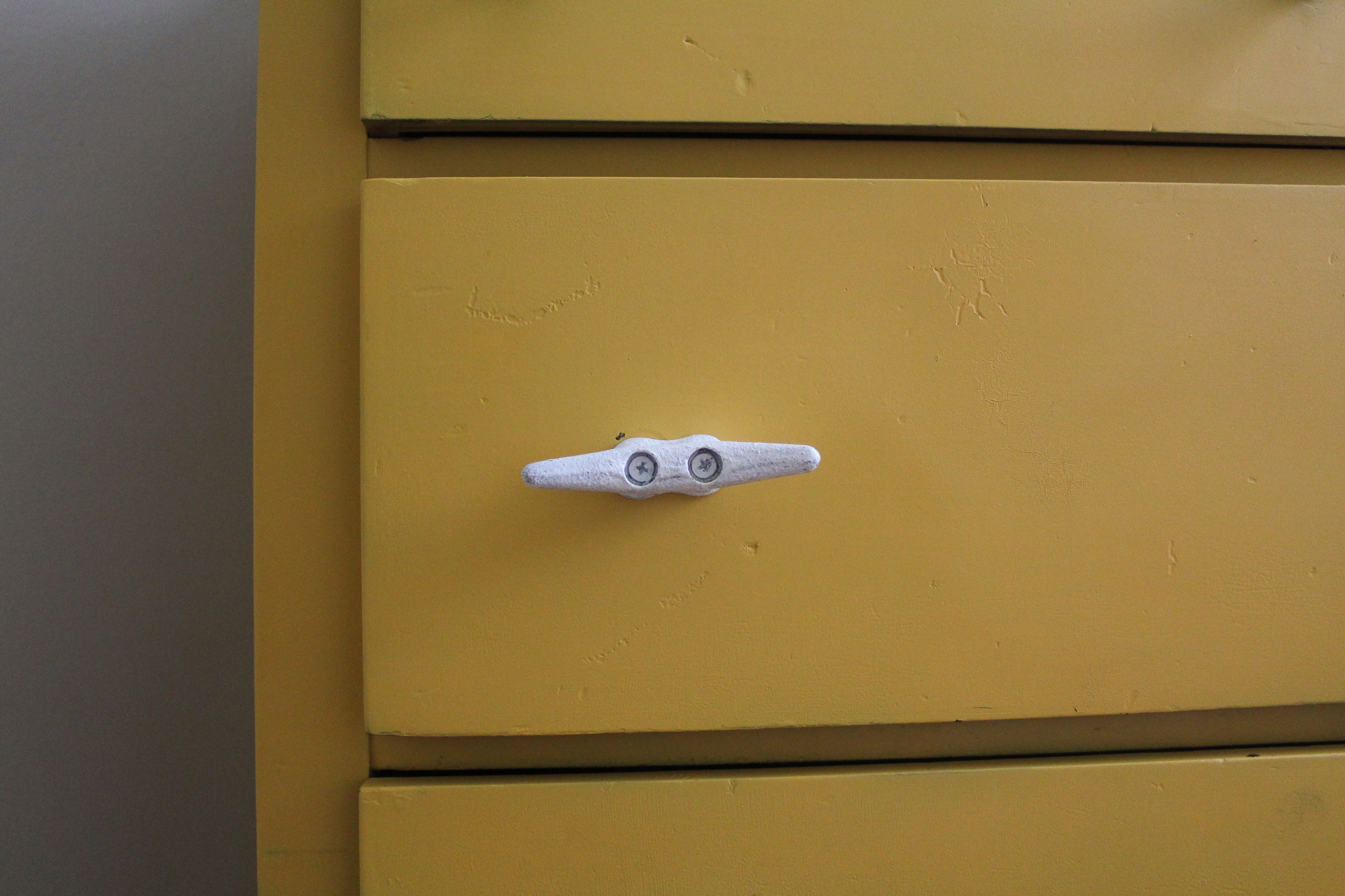 Antique Dresser Painted Yellow with Nautical Deck Cleats