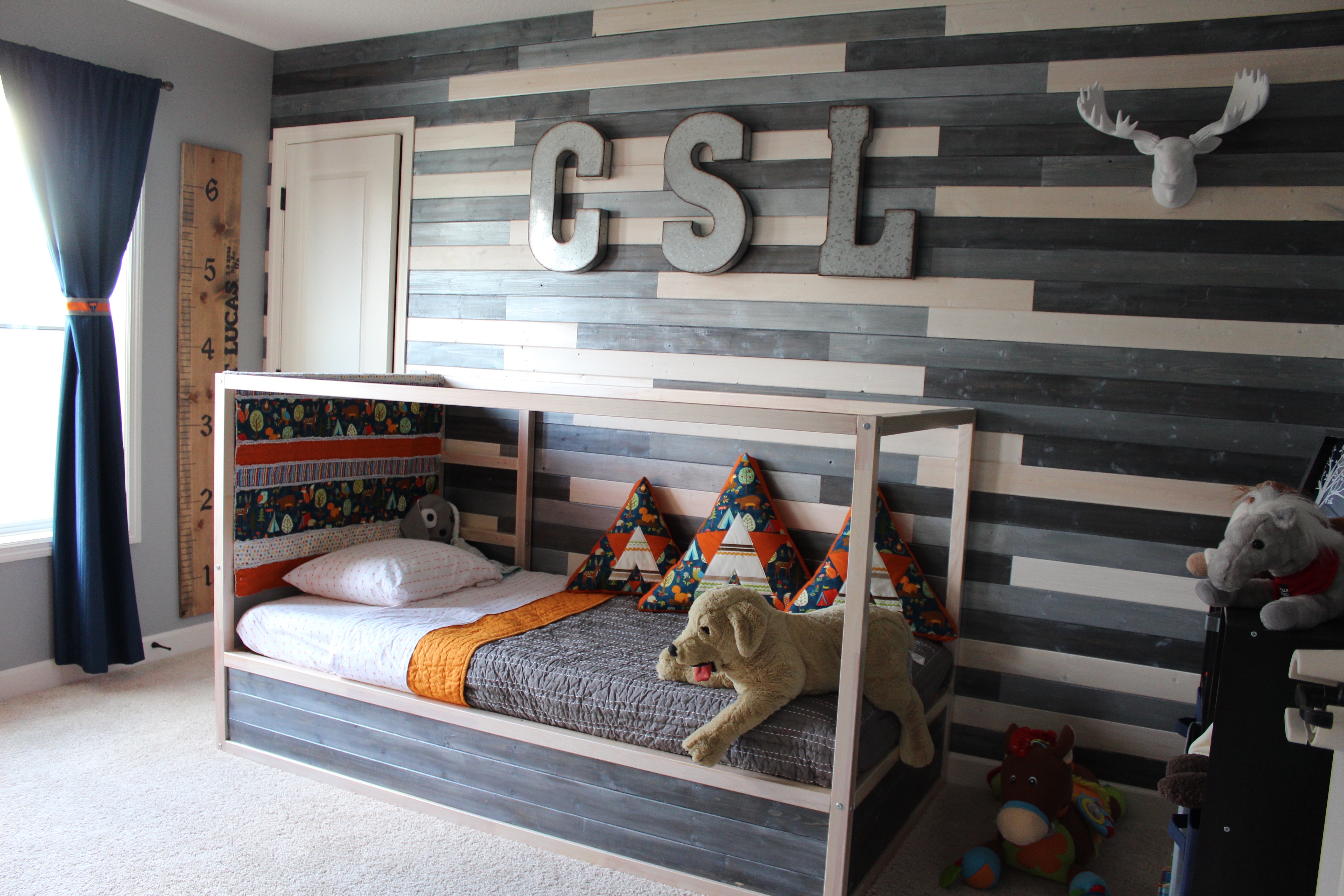 Woodland Toddler Room Featuring DIY Metallic Wood Wall