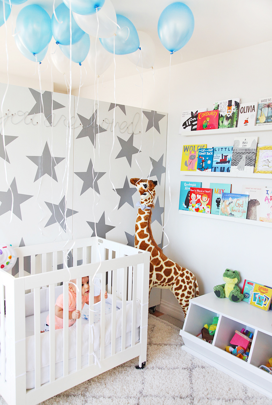 Baby with Balloons in Nursery