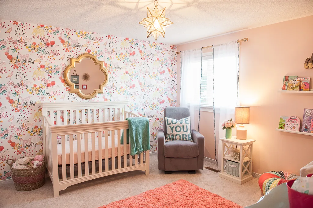 Whimsical Pink Girls Nursery with Floral Accent Wallpaper - Project Nursery