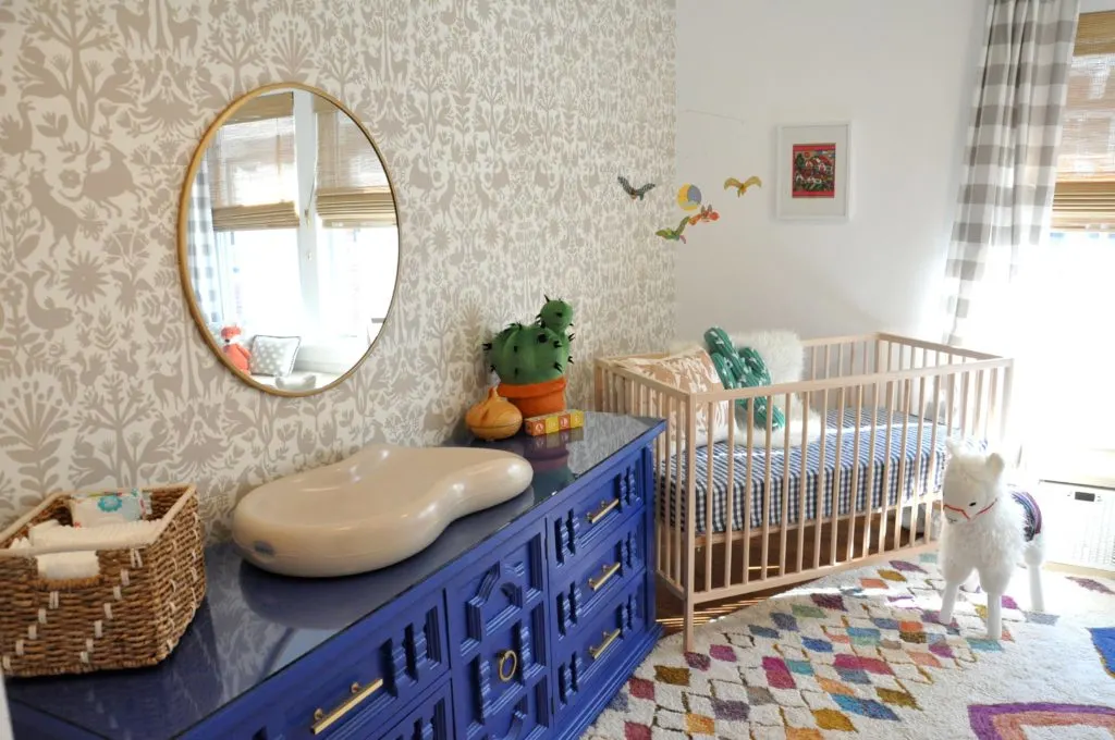 Gender Neutral Llama Nursery - eclectic nursery with otomi wallpaper, foxes and cactus