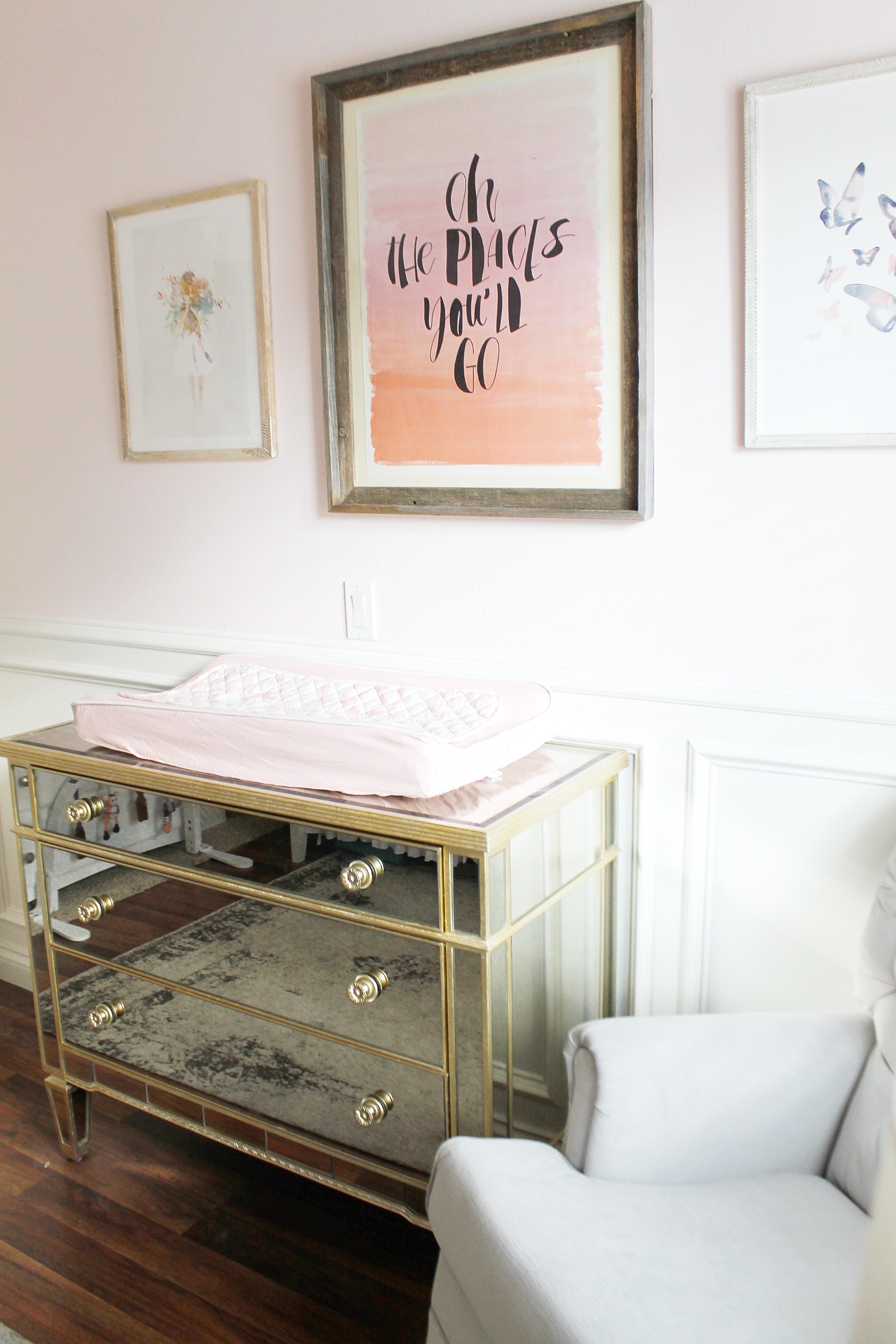 Soft Pink Girls Nursery with Mirrored Dresser