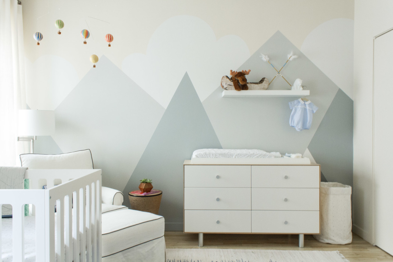 Modern Mountain Mural in Serene Nursery with Hot Air Balloons