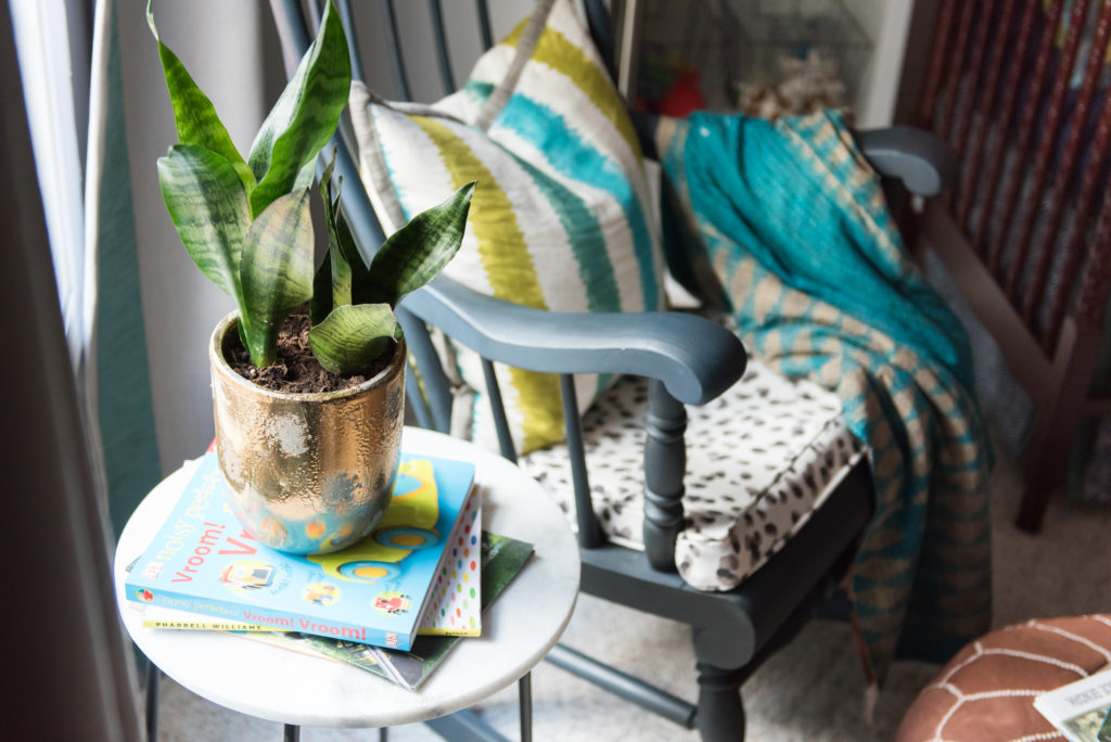 Mid Century Nursery Reading Nook with Rocking Chair and Potted Plant - Project Nursery