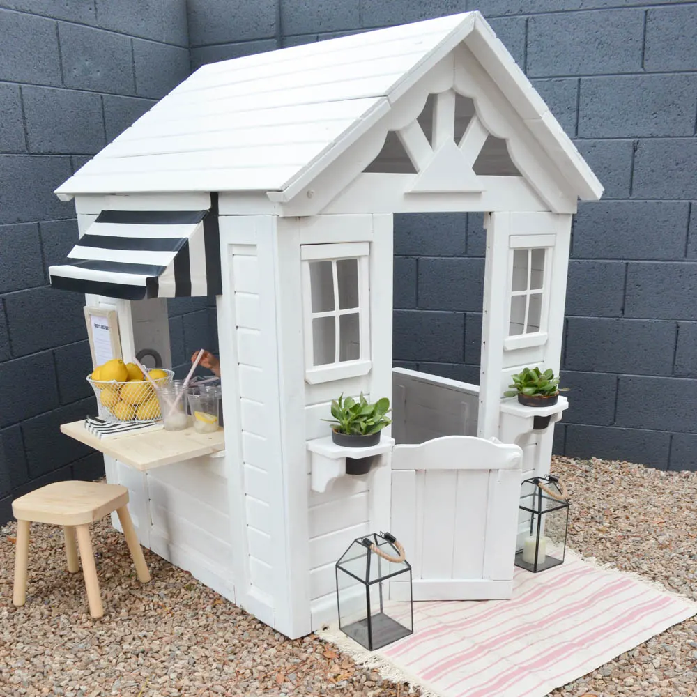 Palm Springs-Inspired Playhouse for Toddlers with DIY Juice Bar