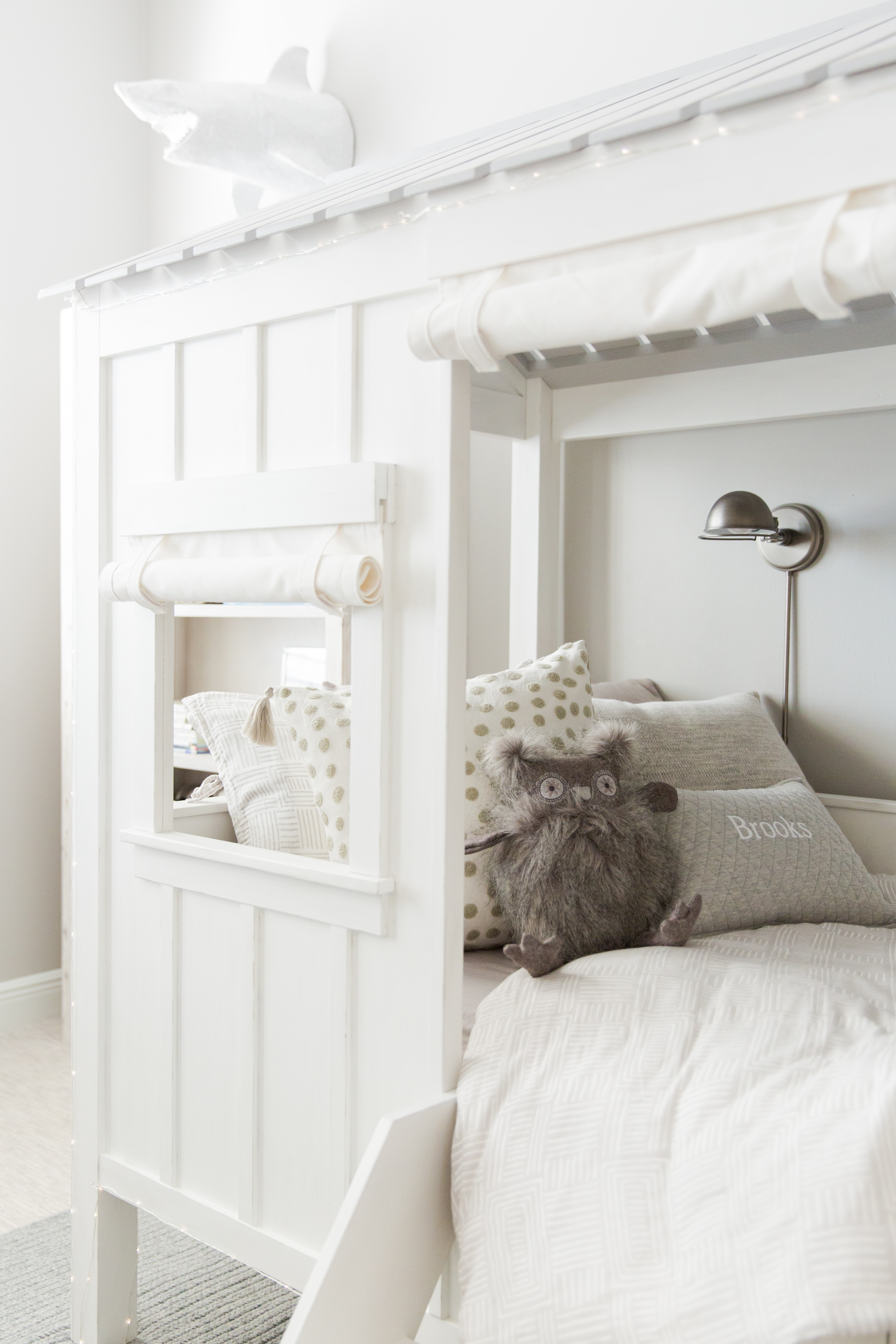 Gray and White Toddler Room with Cozy Cabin Bed