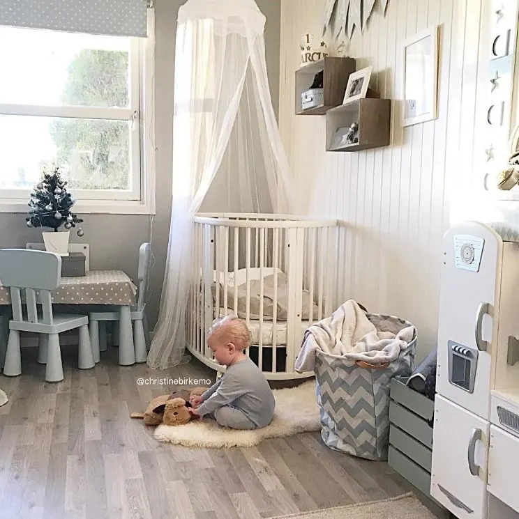 White and Gray Nursery with White Stokke Sleepi Crib and Canopy