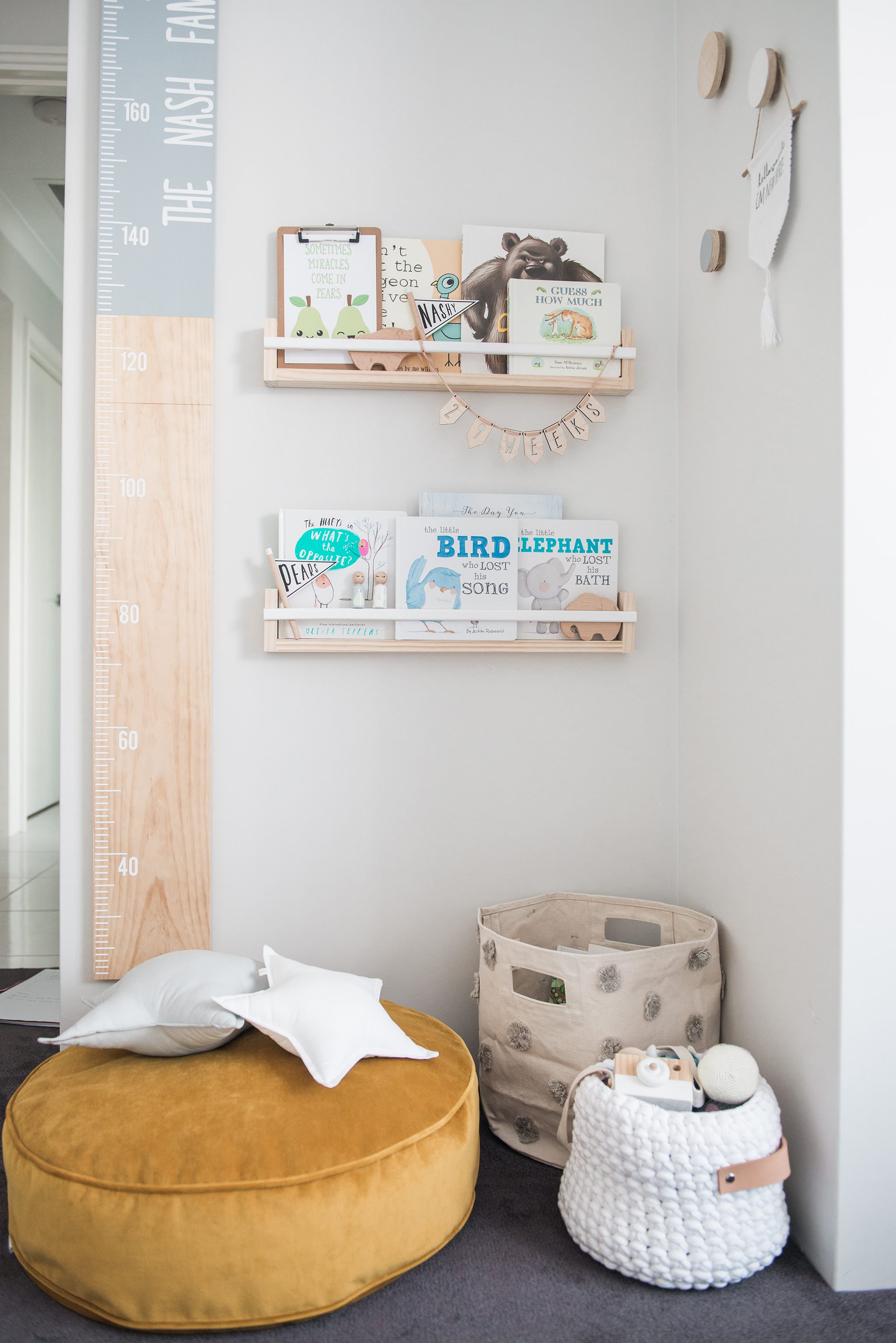 Reading Nook with Growth Chart Ruler and Book Wall Shelves - Project Nursery