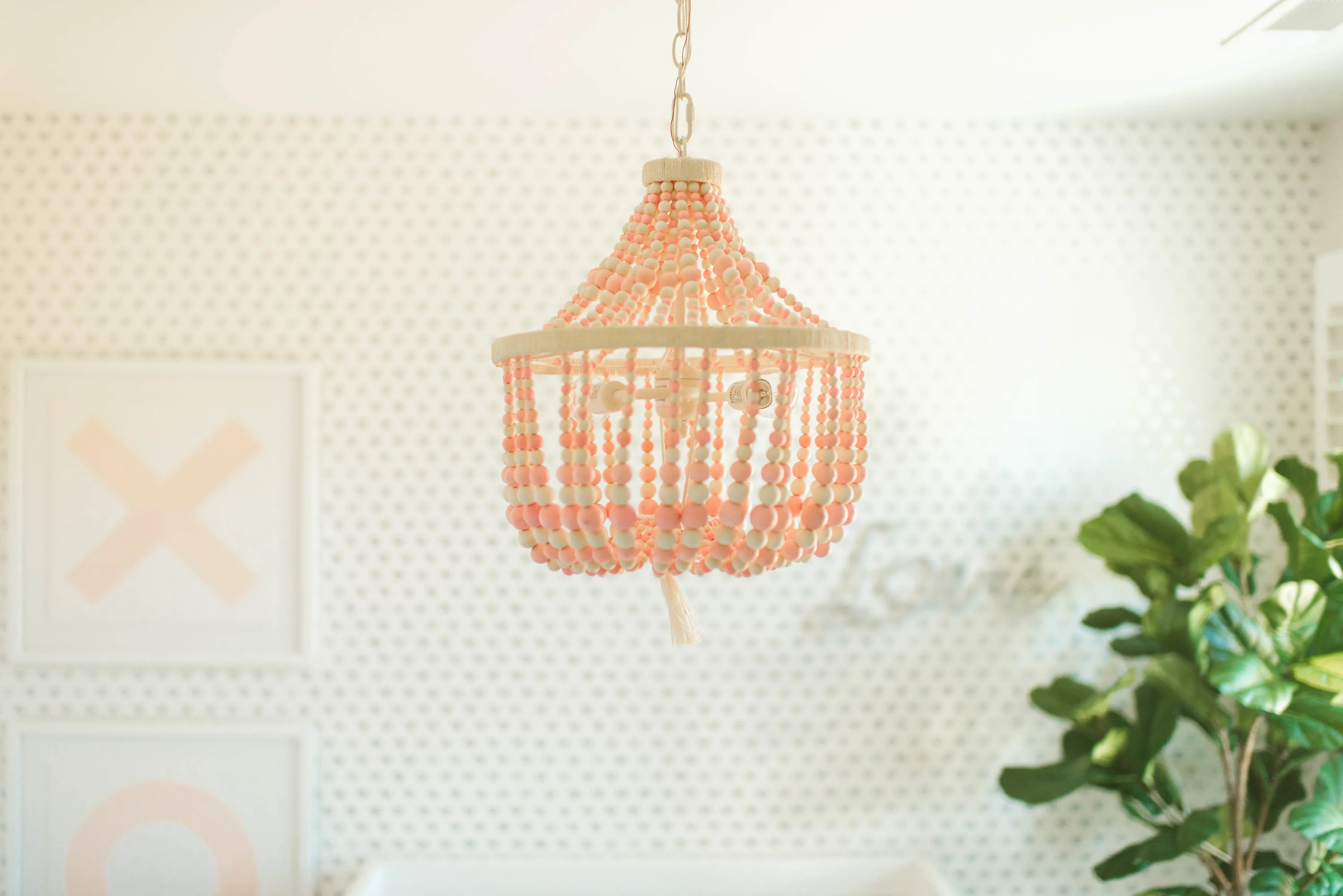 Pink Wood Bead Chandelier in Girl's Pink and White Nursery