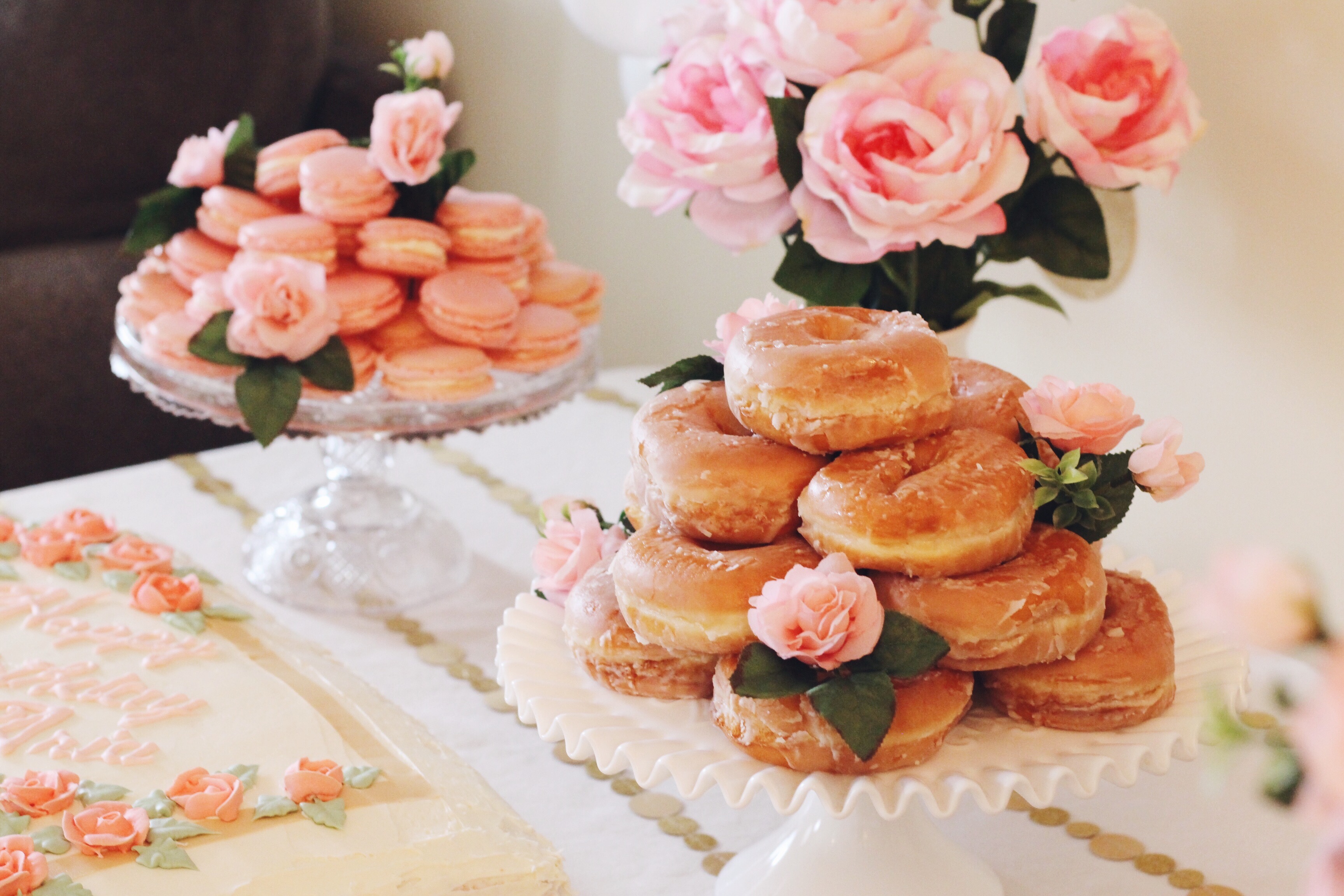 diy party pink floral gold polka dot first birthday party macarons donuts smash cake birthday cake balloon arch
