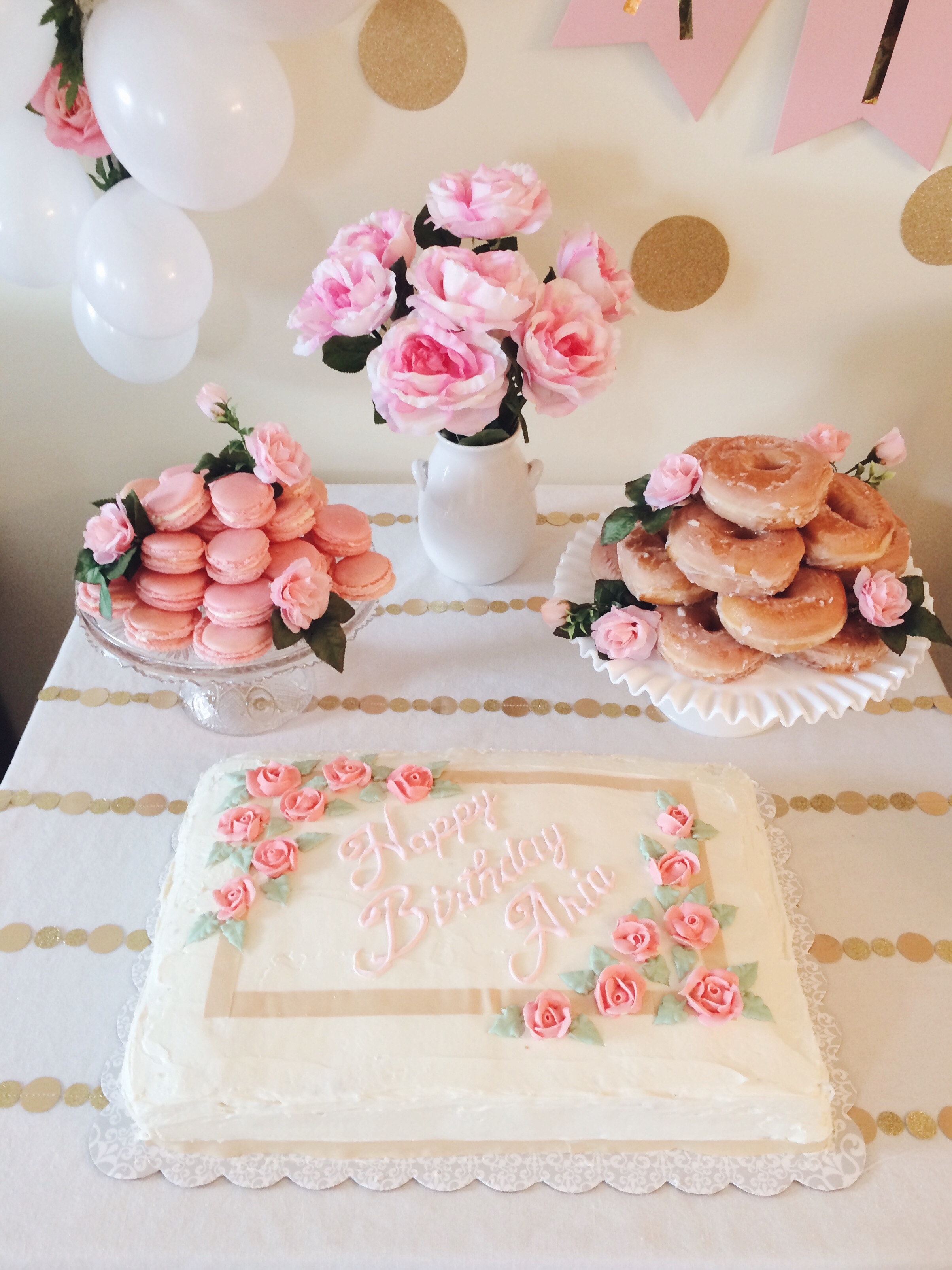 diy party pink floral gold polka dot first birthday party macarons donuts smash cake birthday cake balloon arch