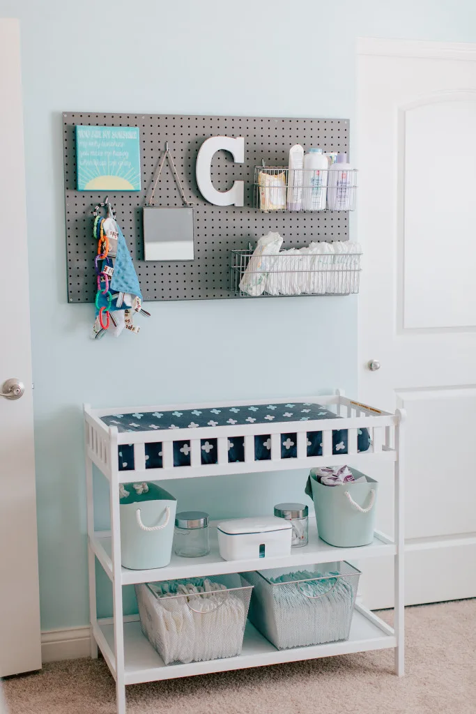 Pegboard Changing Table Organization in Boy Nursery - Project Nursery