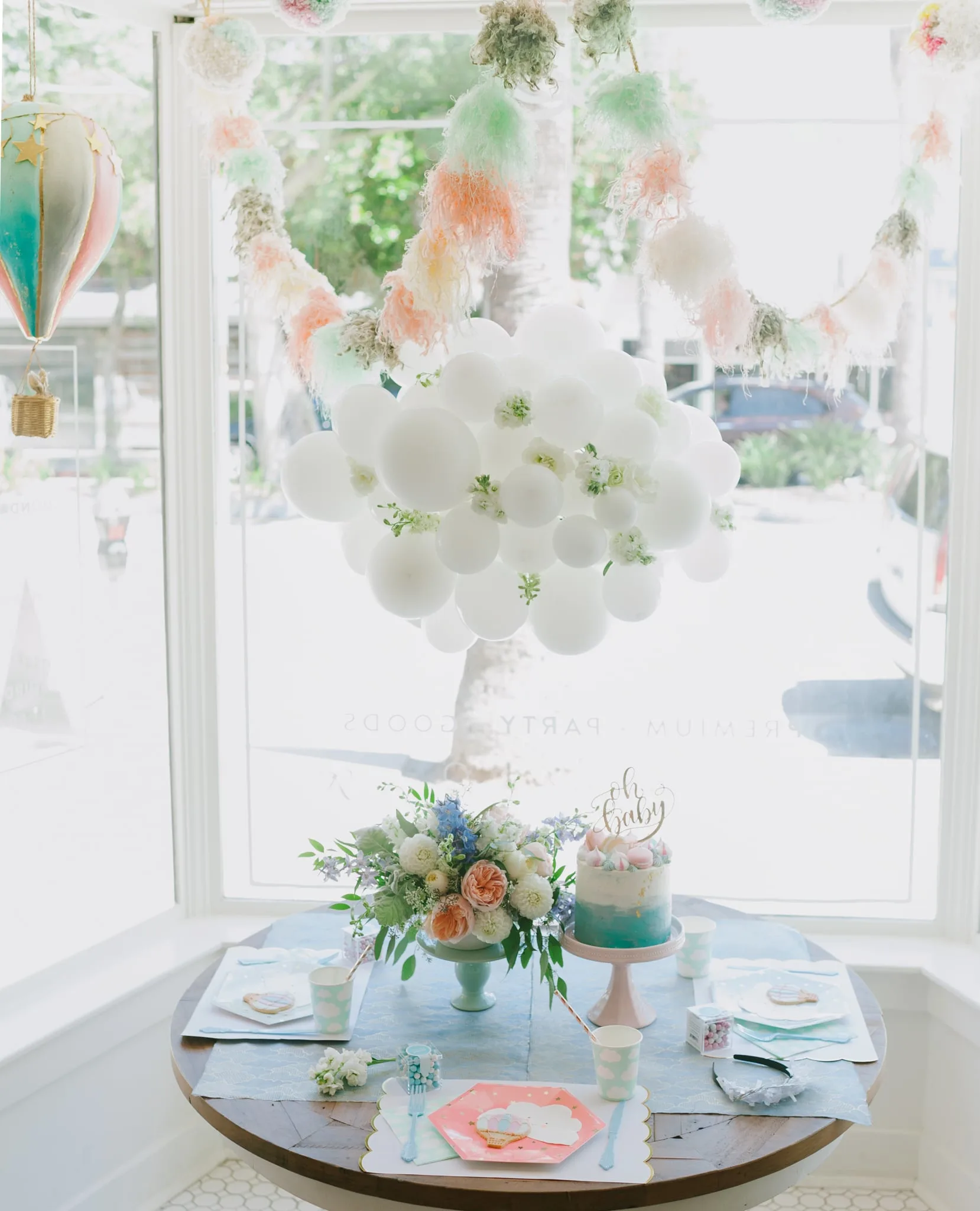 Hot air balloon baby shower tablescape and cloud balloon - Project Nursery