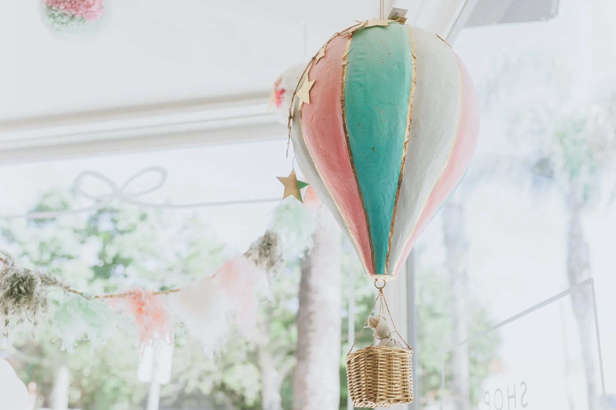 Glitterville pink and turquoise paper mache hot air balloon - Project Nursery