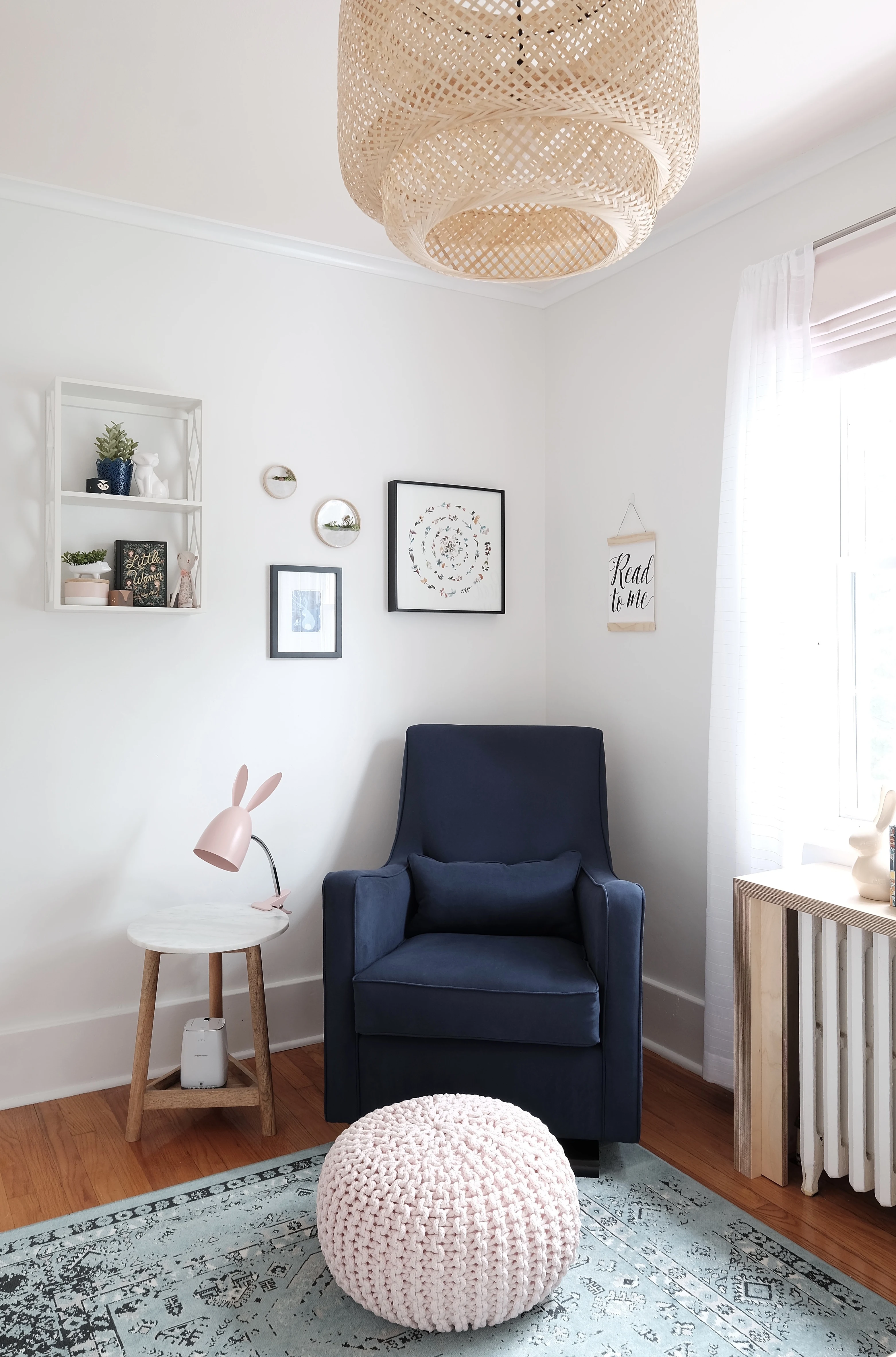 Navy Glider with Pink Knit Pouf in Pink and Blue Girl's Nursery - Project Nursery