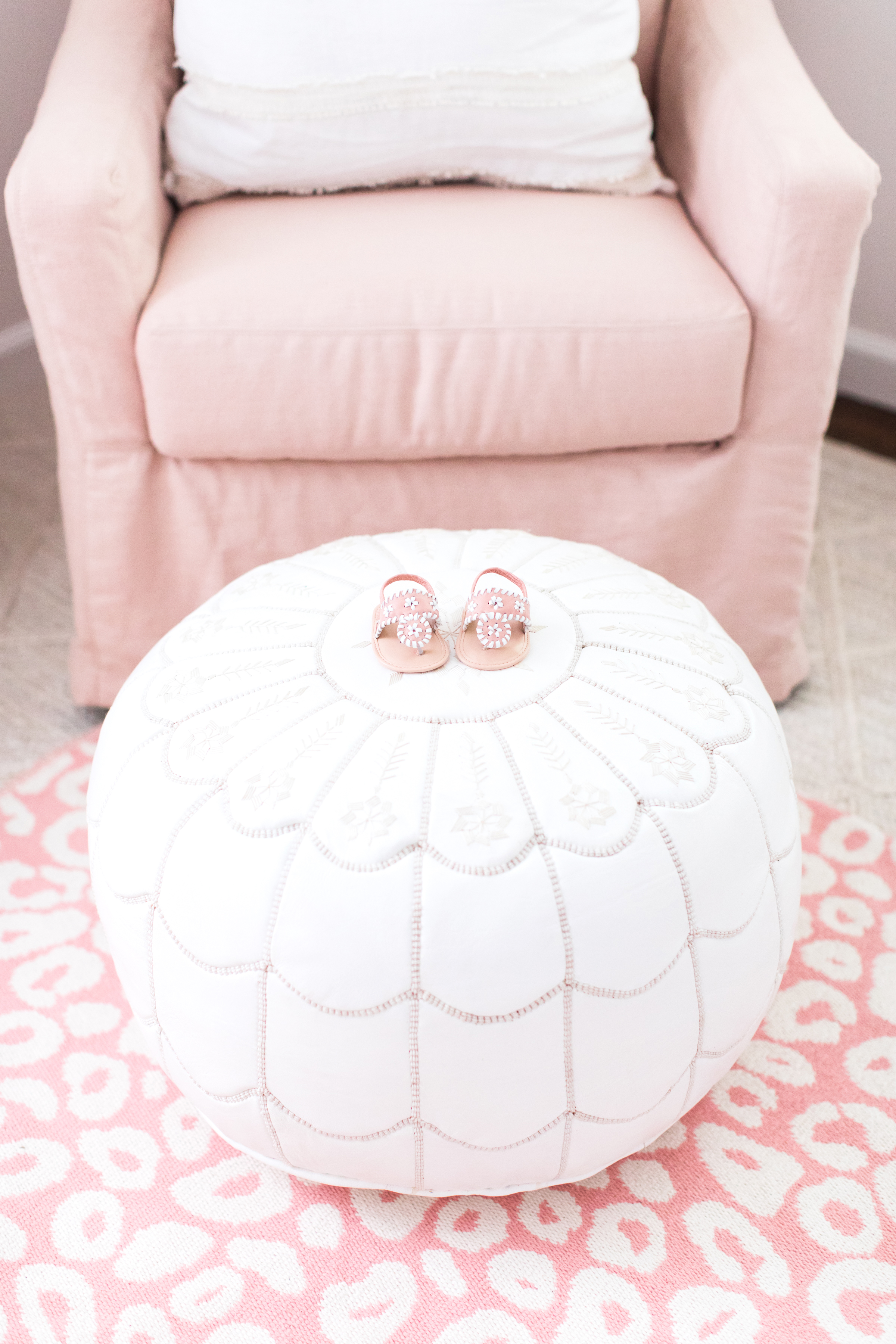 Pink Glider and White Moroccan Ottoman - Project Nursery