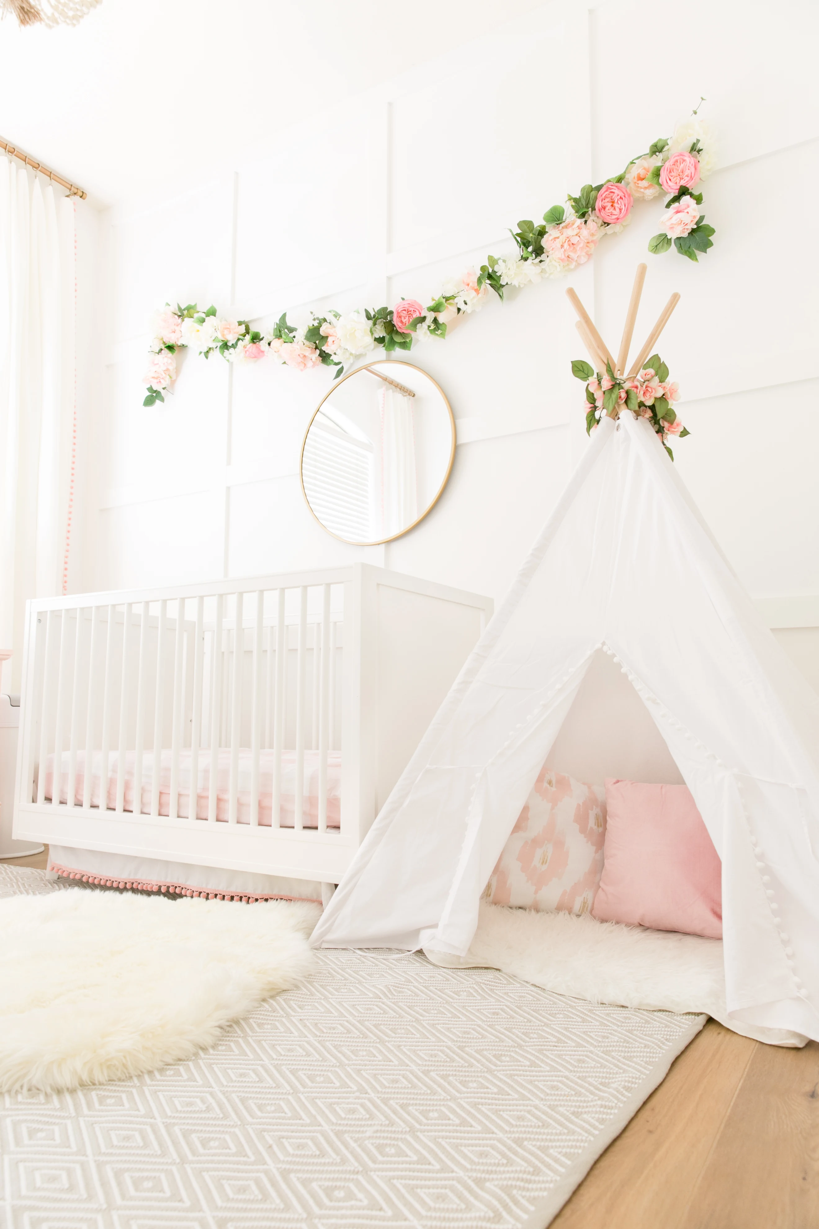 Pink and White Nursery with Teepee
