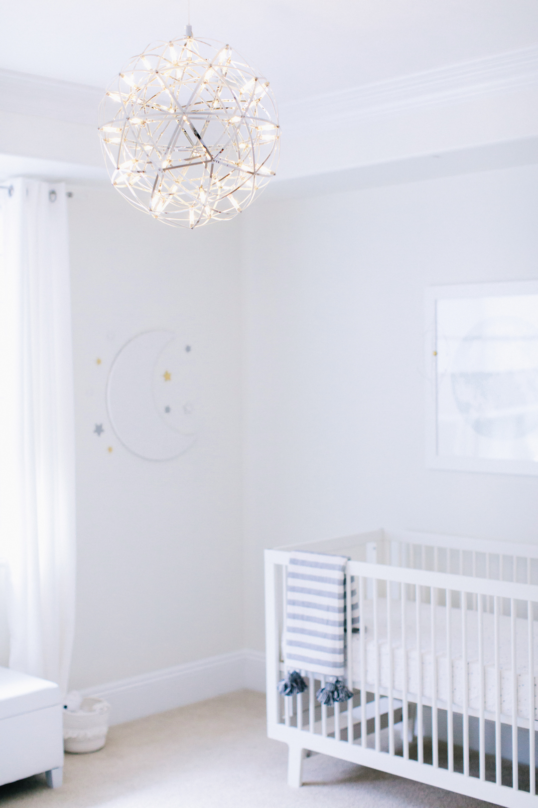 All White Celestial Nursery Design by Little Crown Interiors