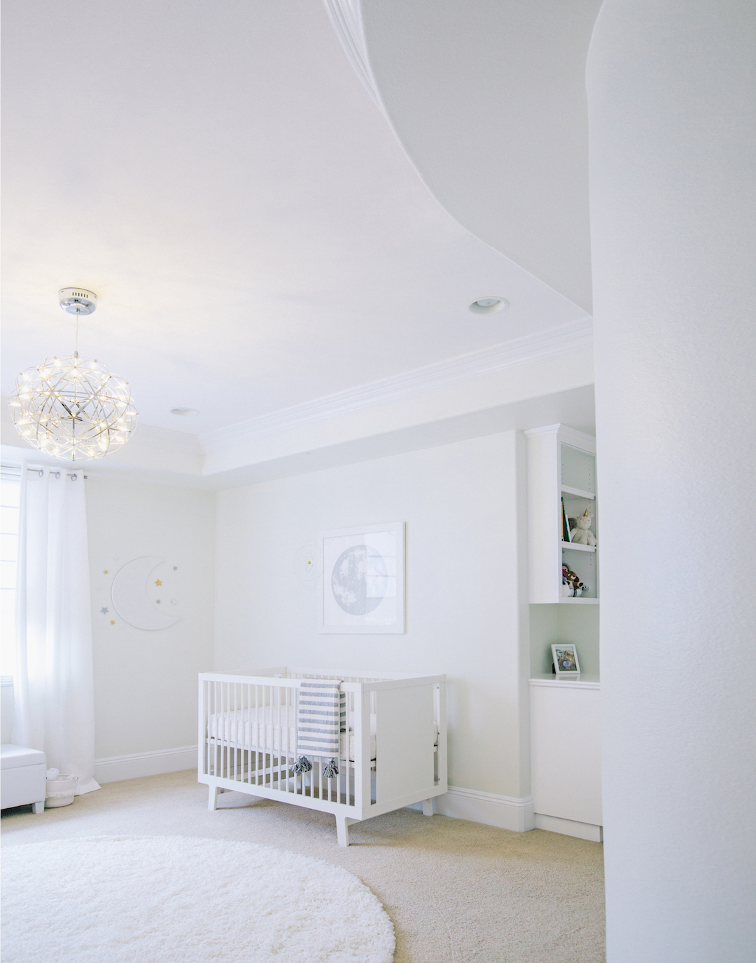 All White Celestial Nursery Design by Little Crown Interiors