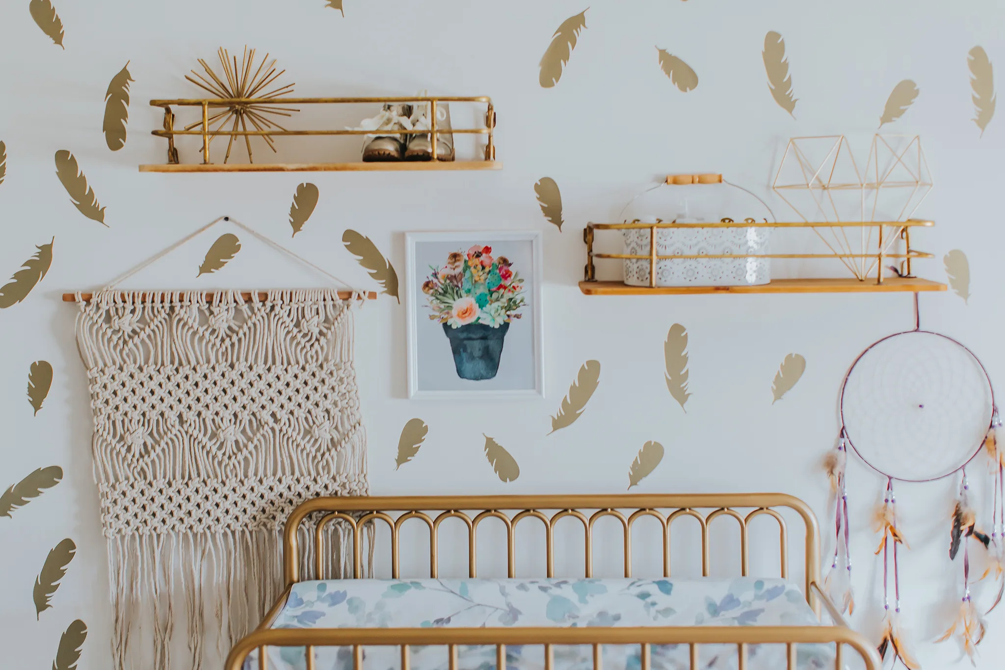 Gold Feather Decals and Gold Changing Table in Girls' Boho Nursery