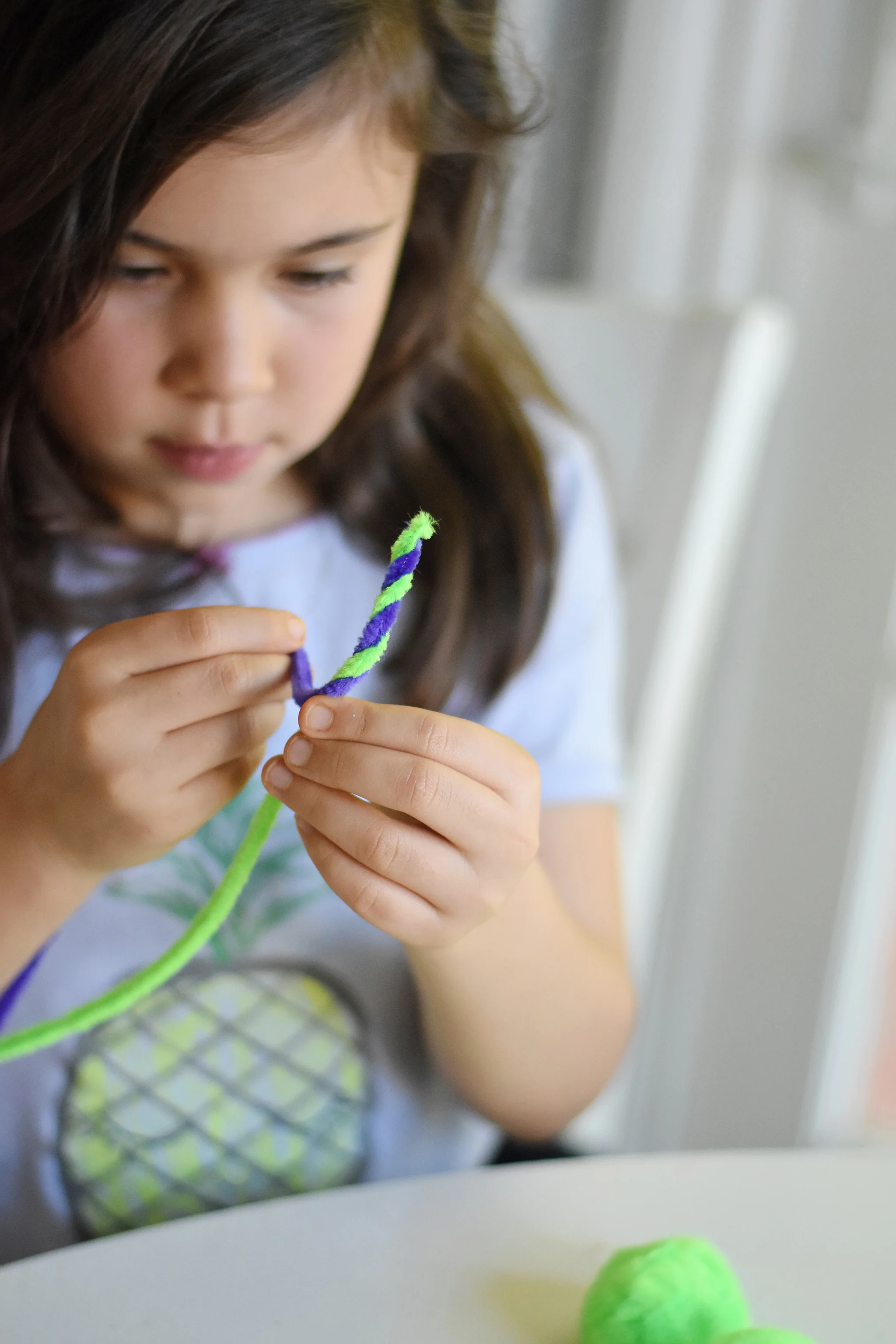 Twist your pipe cleaners together to make the headband