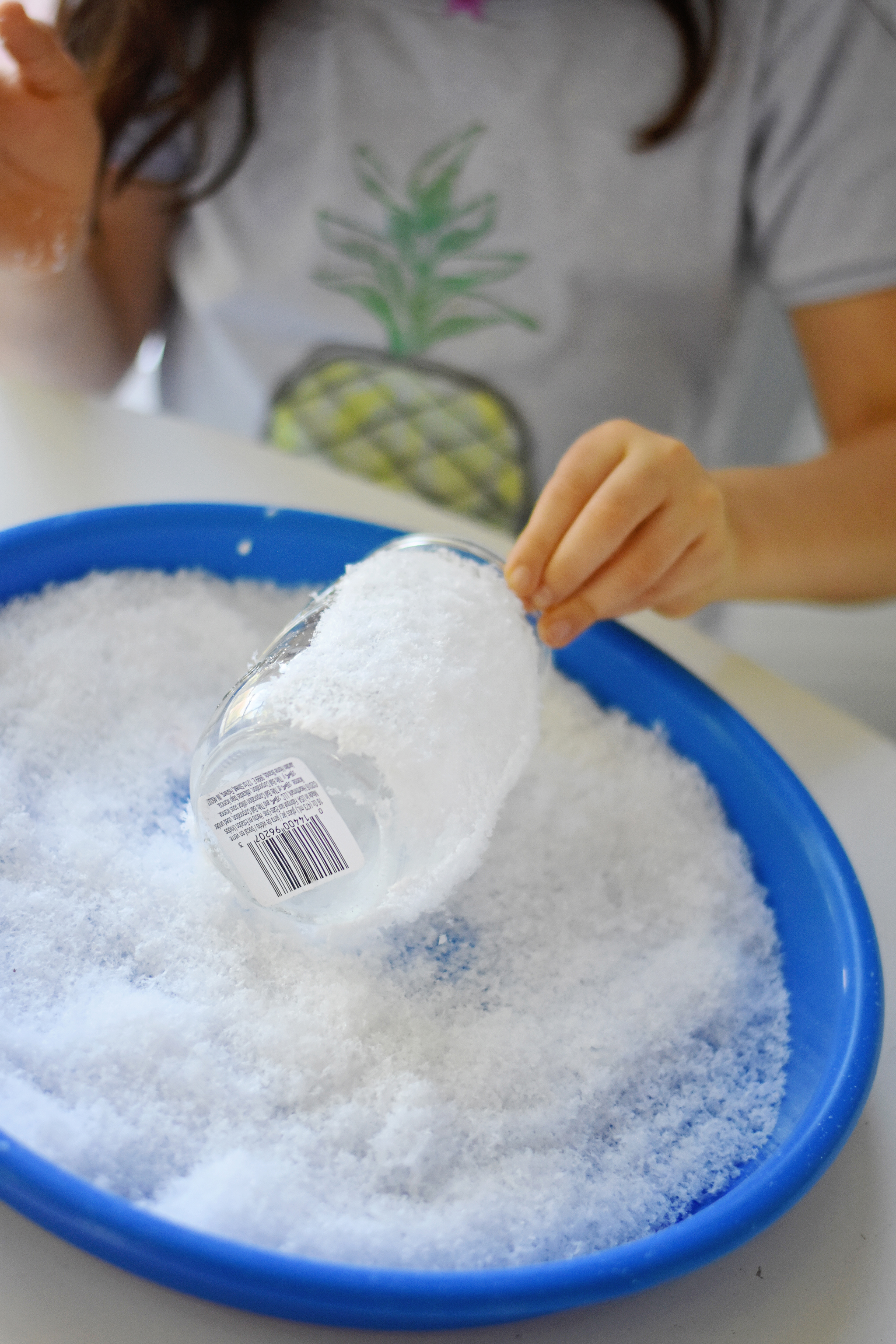 Roll your mason jar in the fake frosty snow