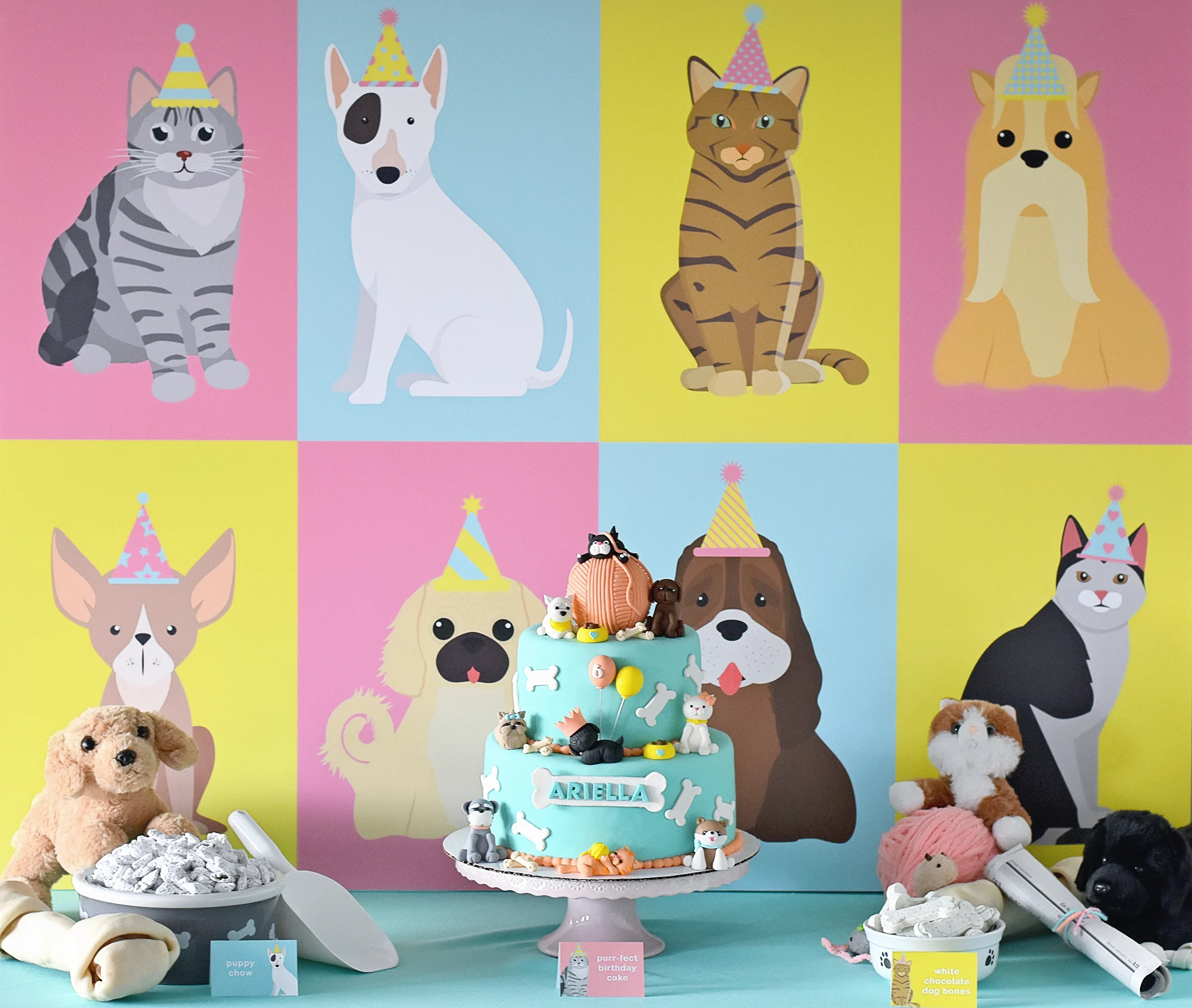Cake table with the purr-fect graphic print backdrop!