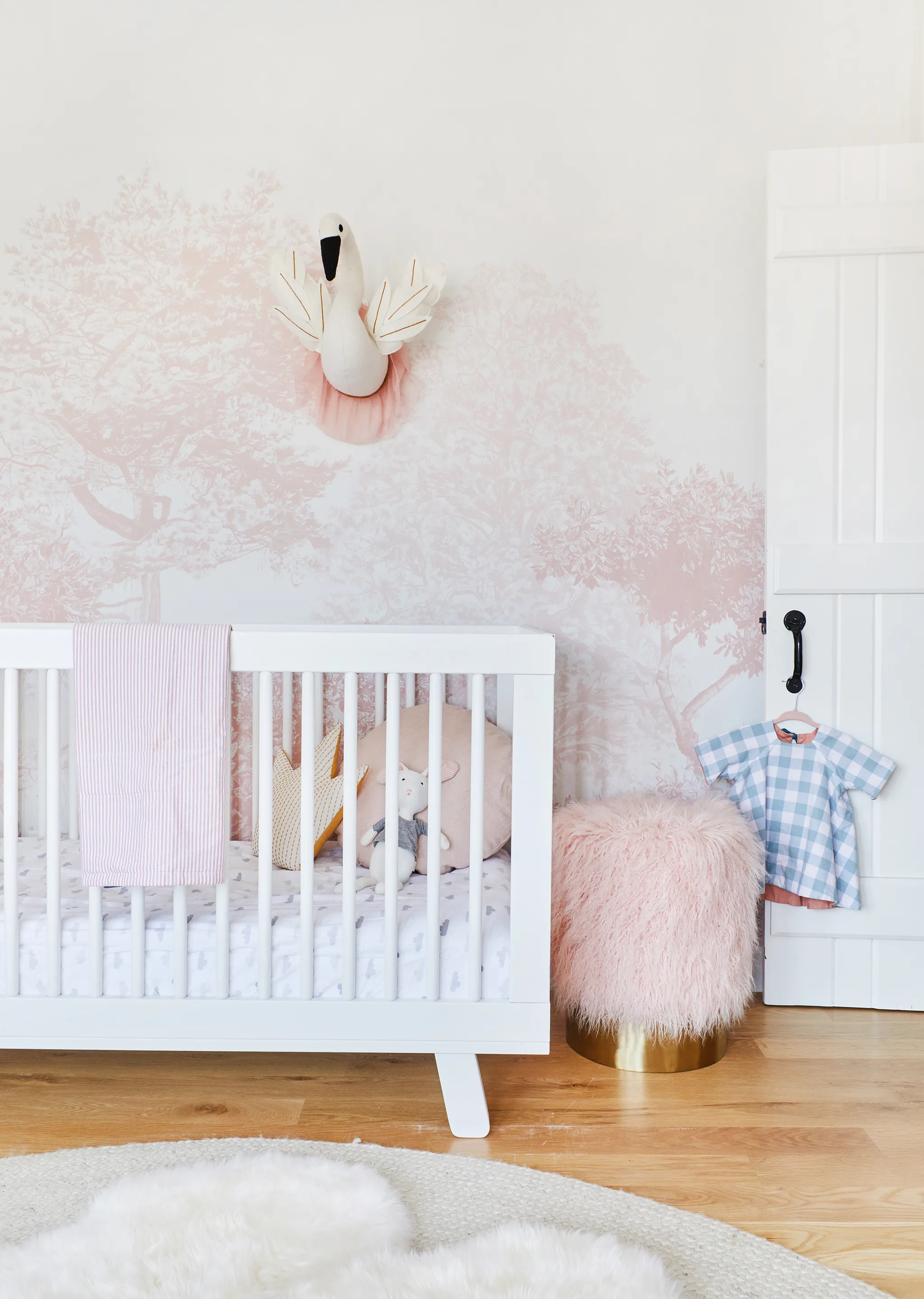 Emily Henderson Girl Nursery with Pink Tree Wallpaper