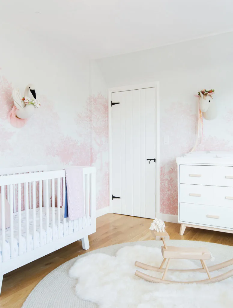 Emily Henderson Girl Nursery with Pink Tree Wallpaper