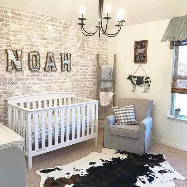 Brick Accent Wall in Nursery with Cow Theme