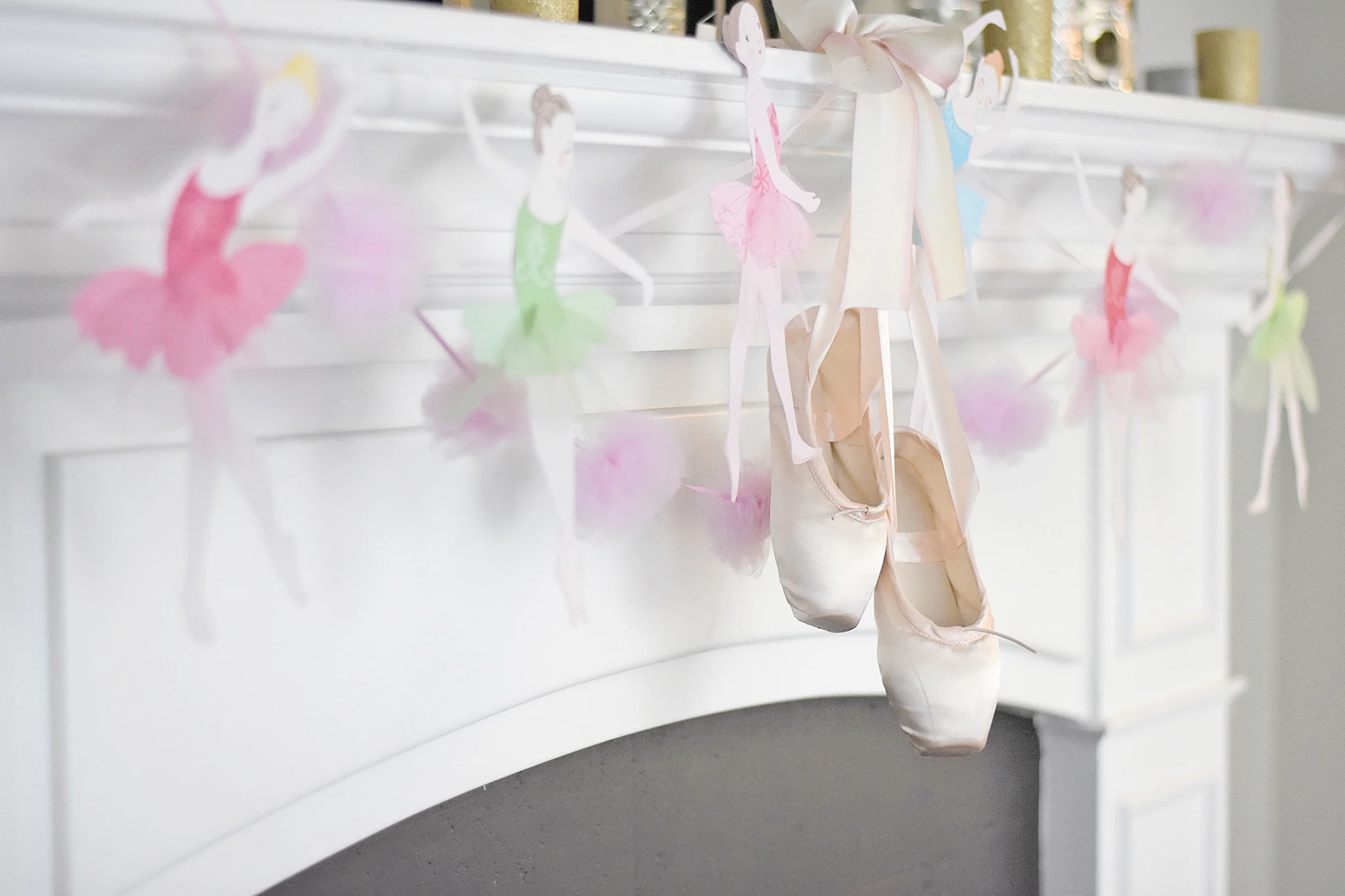 Stunning party decor featuring Ballerina garland and real pointe ballet shoes!