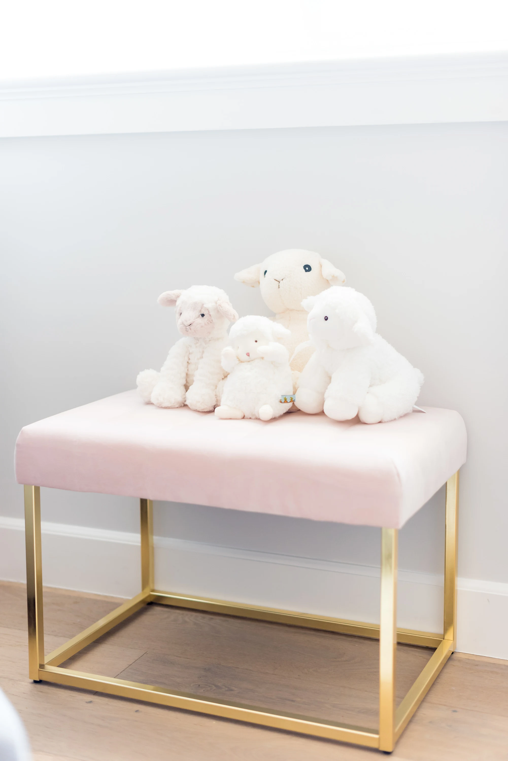 Stuffed Lambs on Pink Velvet Bench