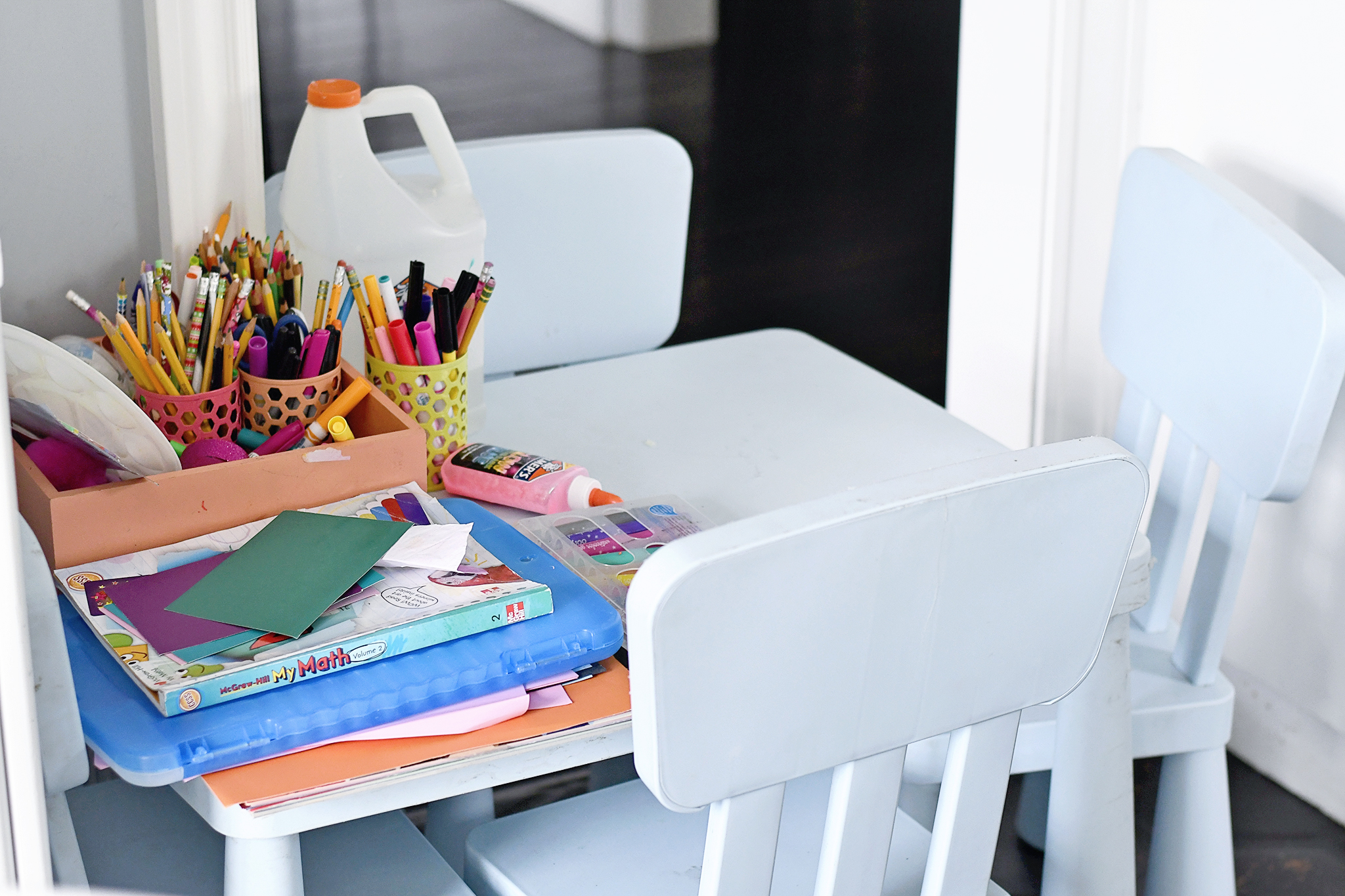 Utilize walls instead of floor space to clean up clutter!