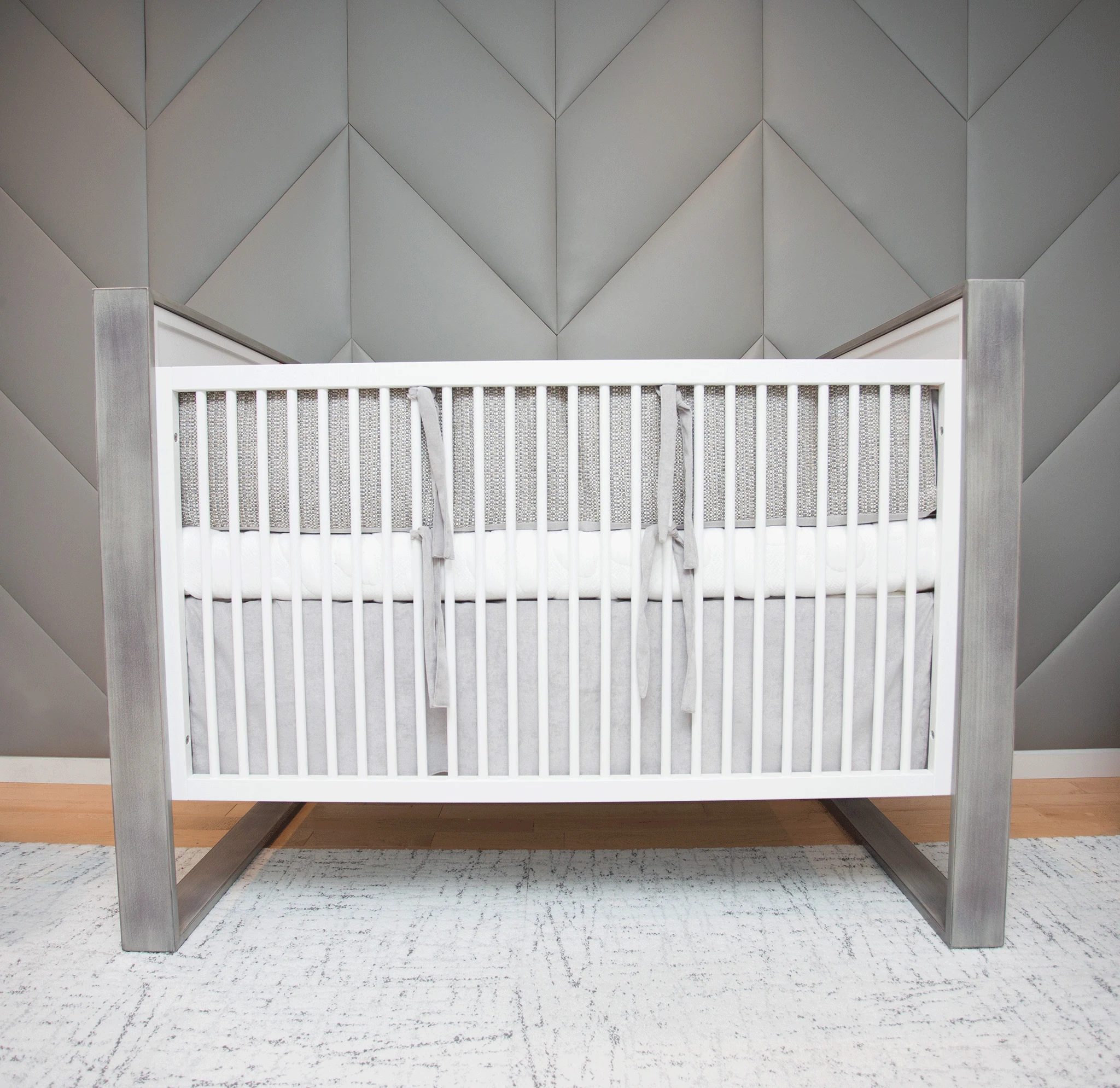 Modern Boy's Nursery with Upholstered Wall