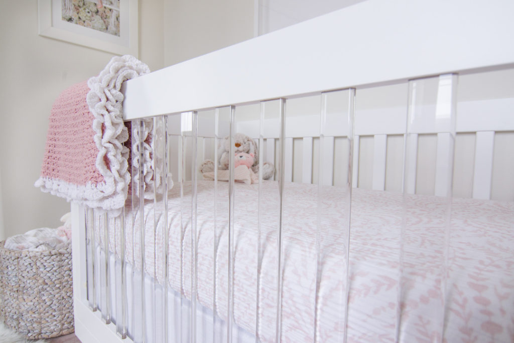 Acrylic Crib in Blush Nursery