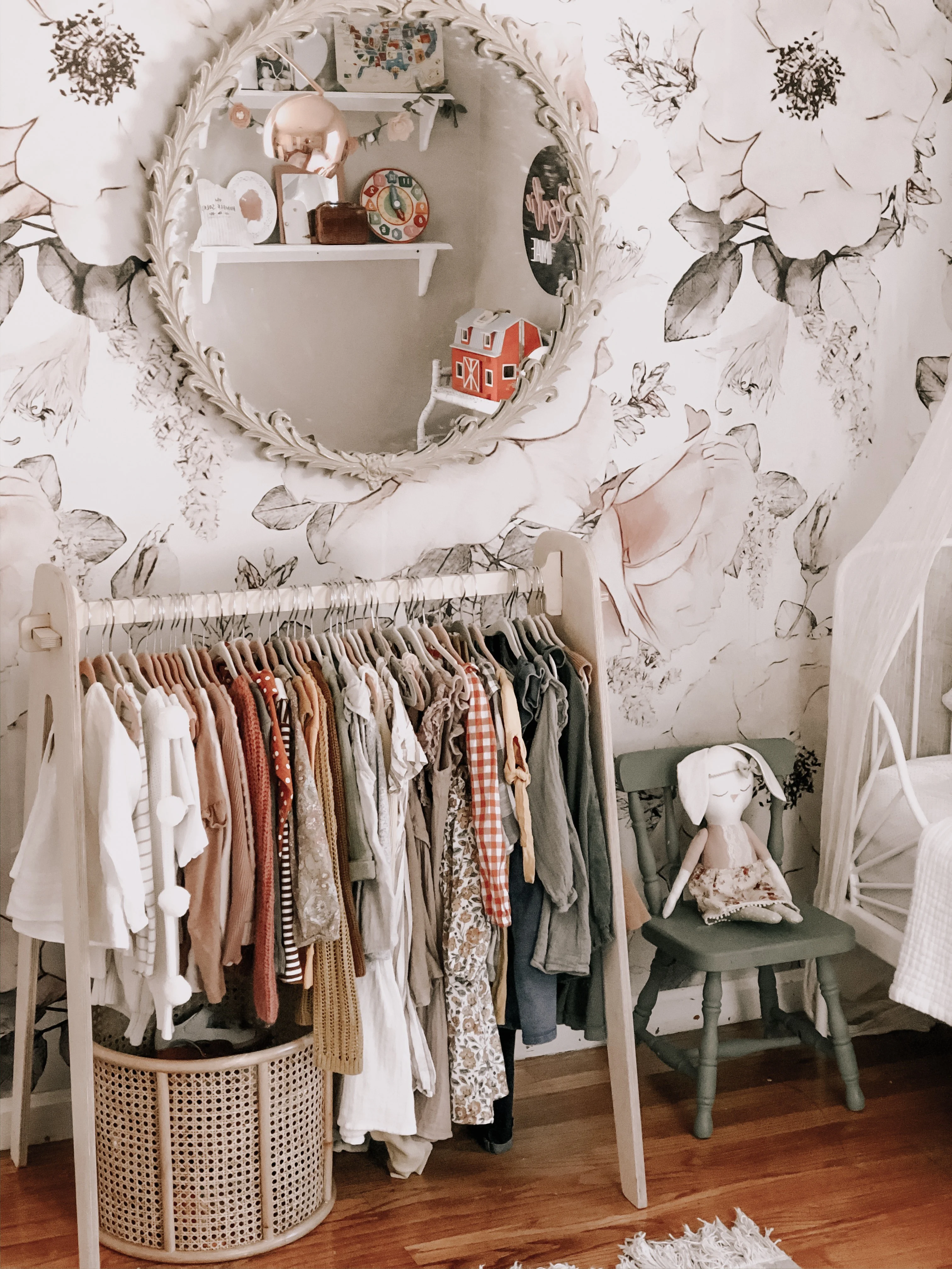 Floral Wallpaper in Girl's Room with Free Standing Clothes Rack