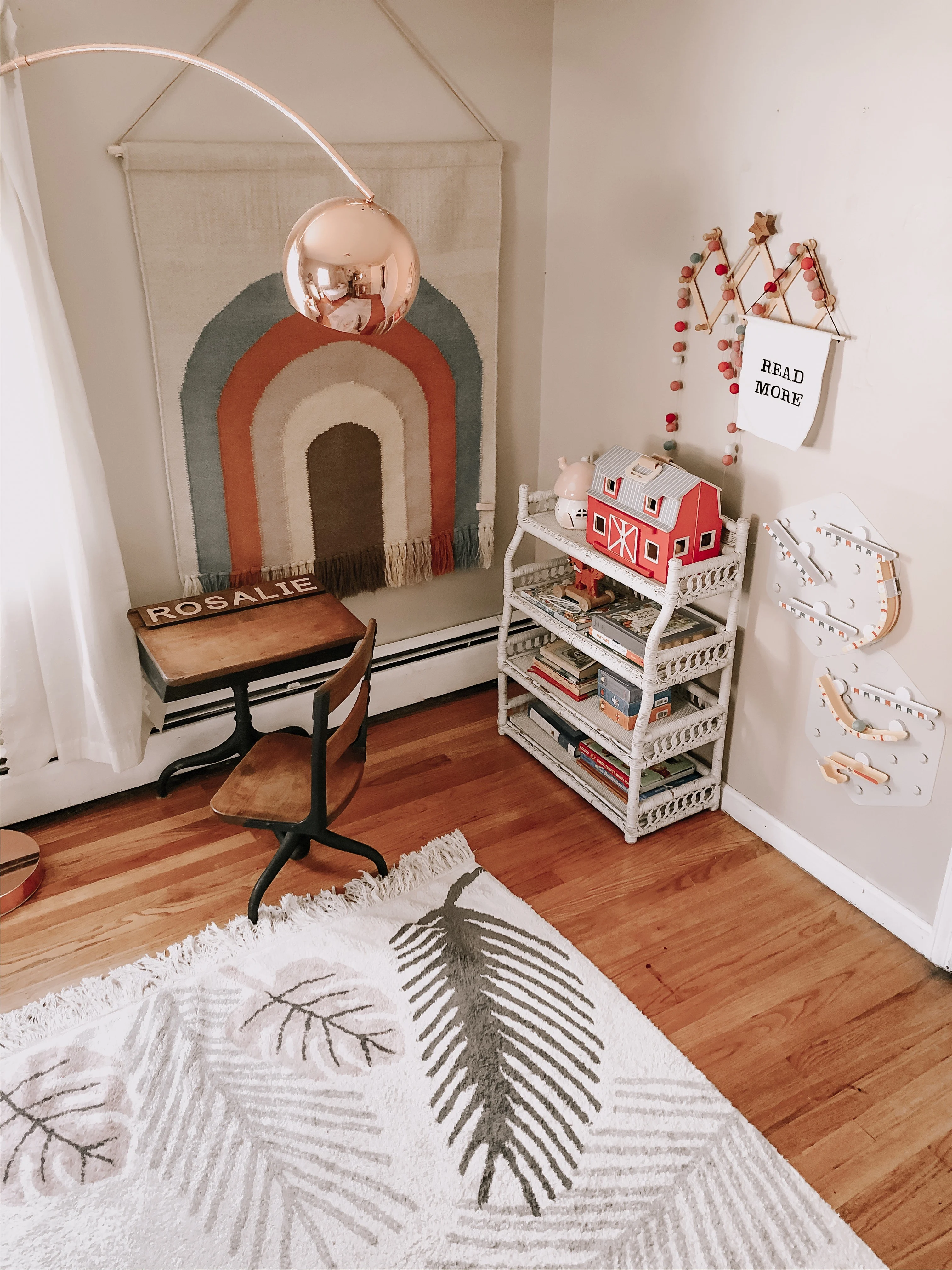 Girl's Room with Vintage Desk and Rainbow Wall Hanging (look at that cool marble run!)