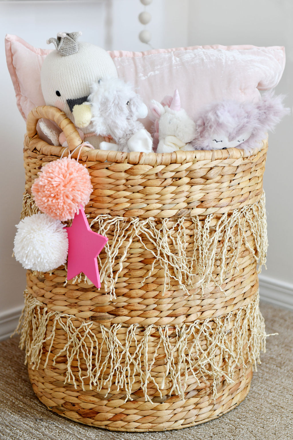 Stuffed Animal Storage in Girl's Room with Pom Pom Accent