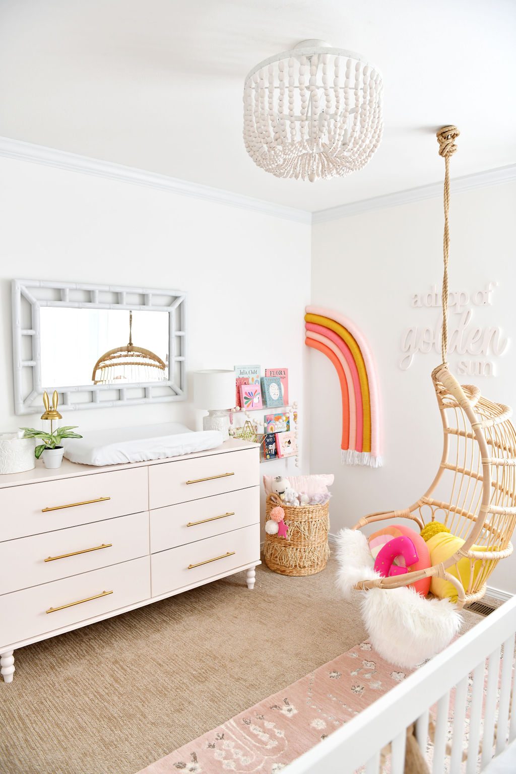 Baby Girl Nursery with Rainbow Theme and Pink IKEA Hack 