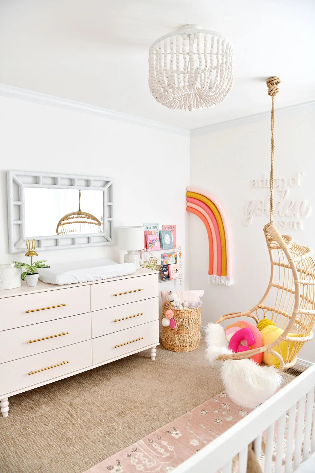 Baby Girl Nursery with Rainbow Theme and Pink IKEA Hack 