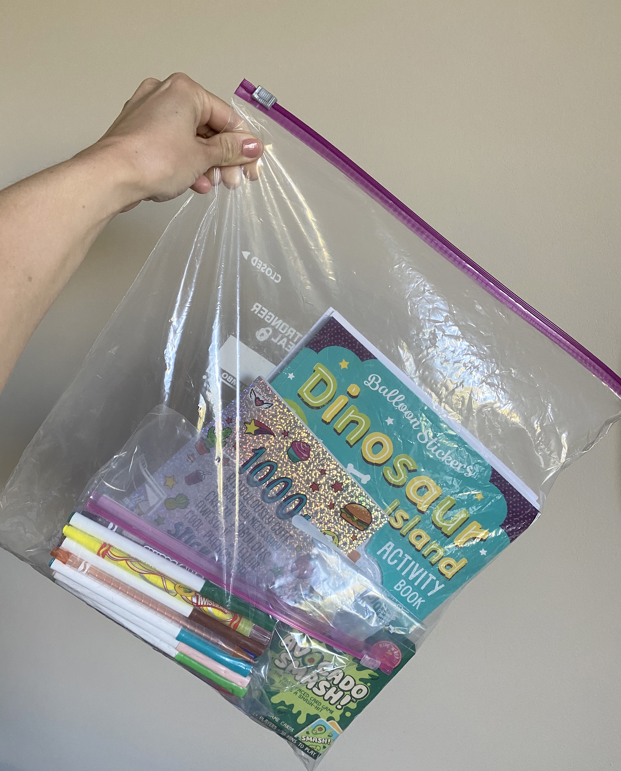 A fancy ziploc bag is usually my go-to to bring all the goodies to keep then entertained!