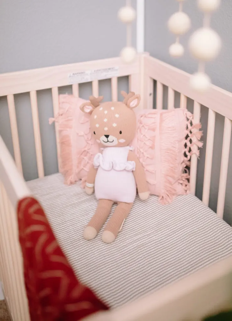 Cuddle + Kind Deer Doll in Natural Mini Crib with Striped Mini Crib Sheet