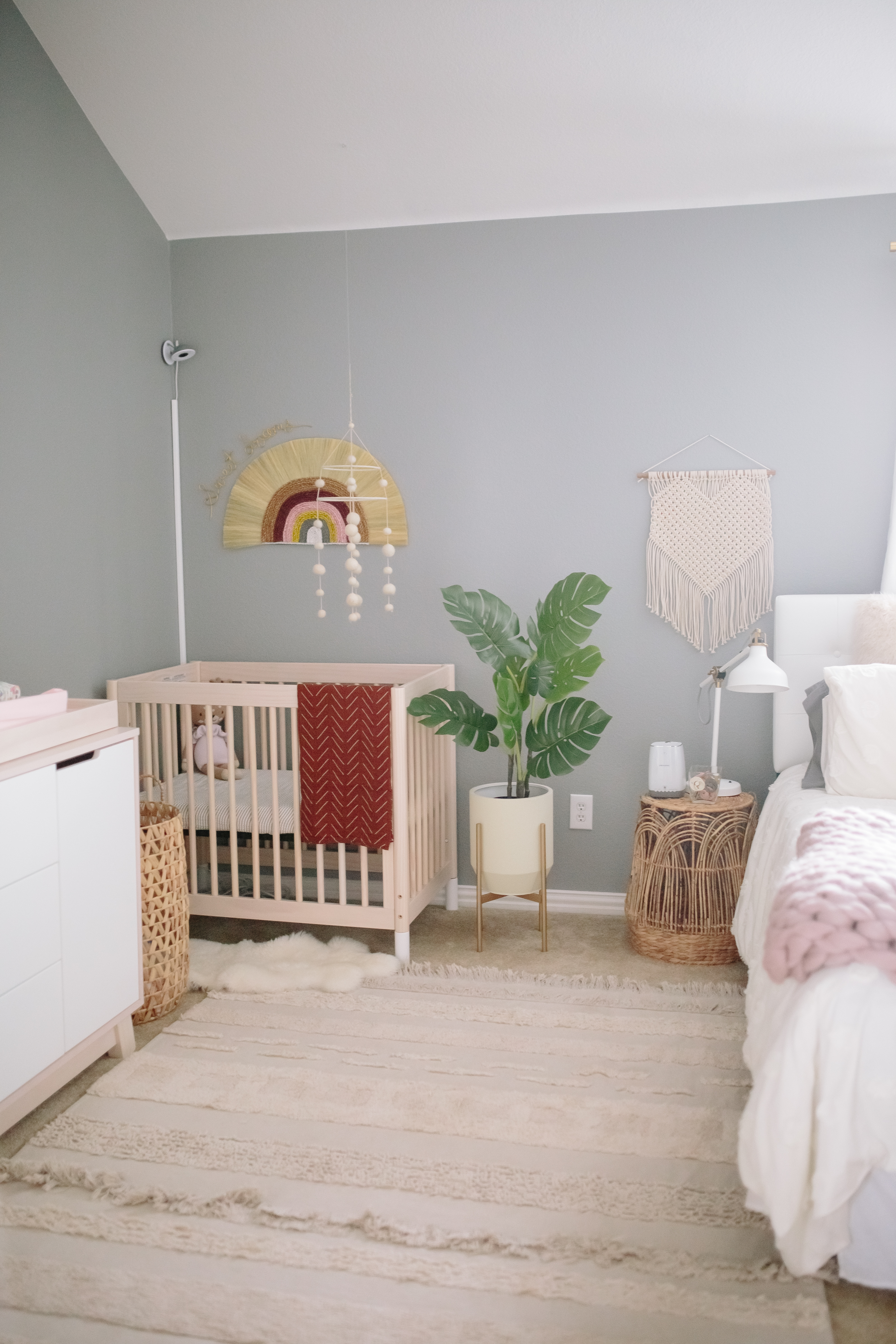 Mini crib in master hot sale bedroom