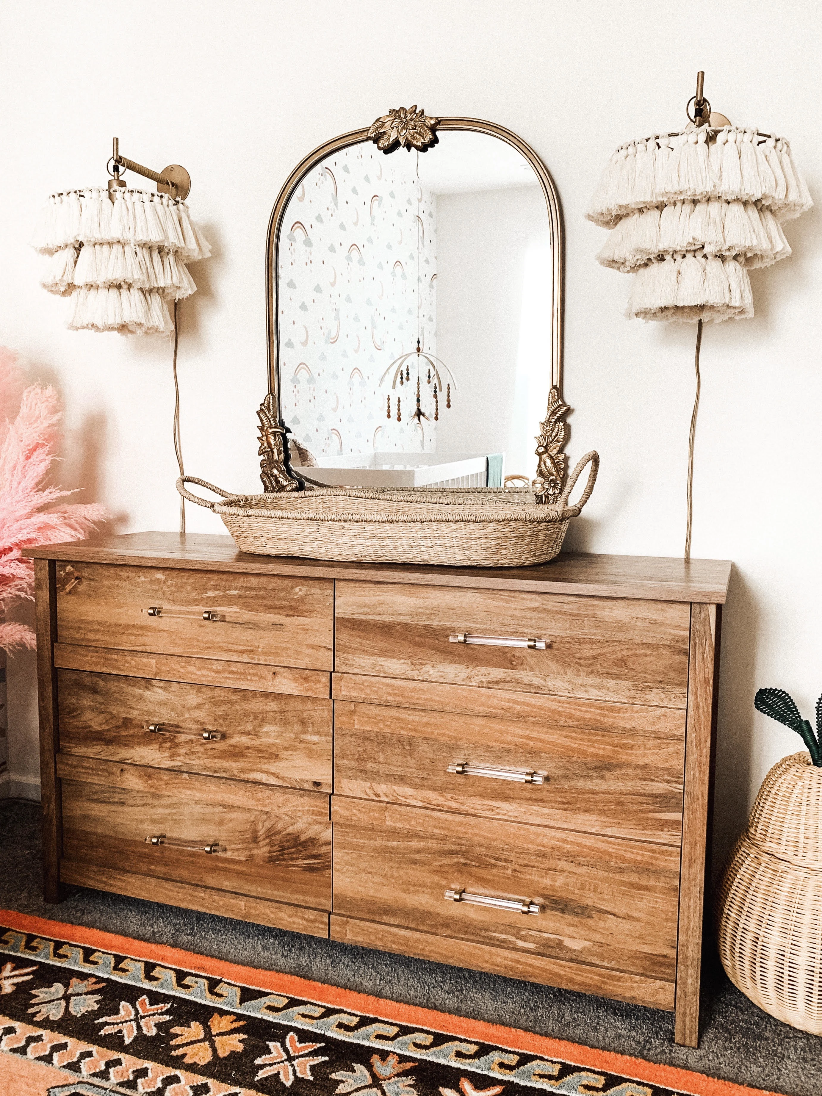 Wood Dresser with Changing Basket and Tassel Wall Pendants