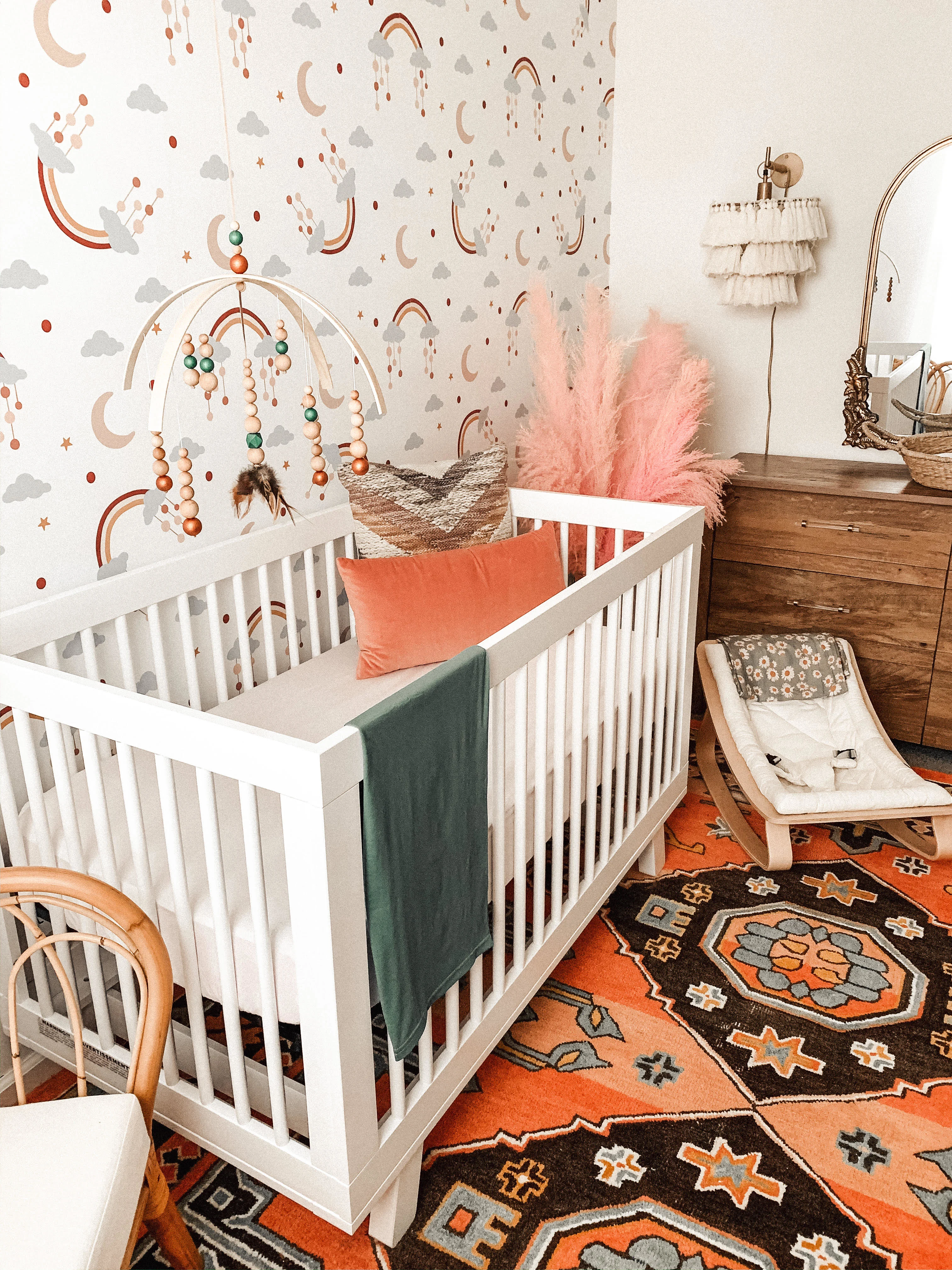 Muted Rainbow Cloud Wallpaper in Baby Girl Nursery