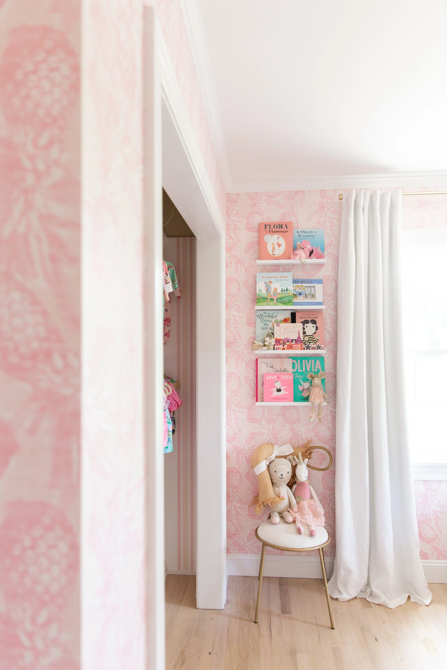Pink Pineapple Wallpaper with Book Display in Baby Girl Nursery