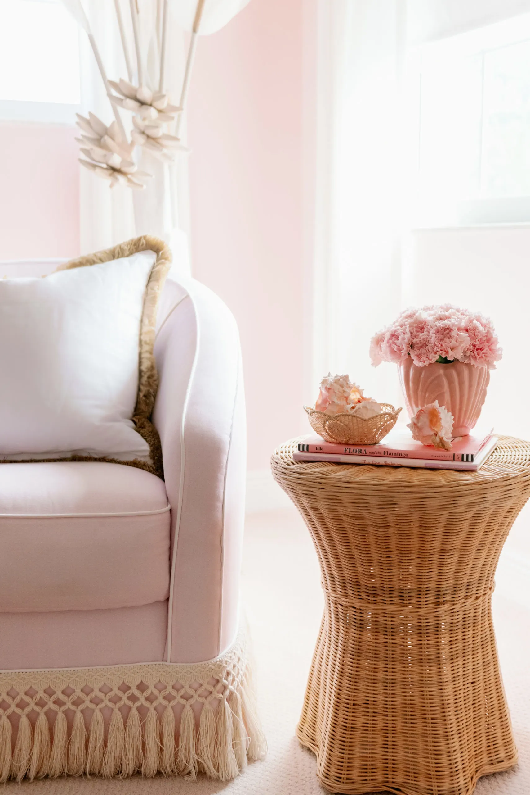 Rattan Side Table and Tassel Trim Added to Glider