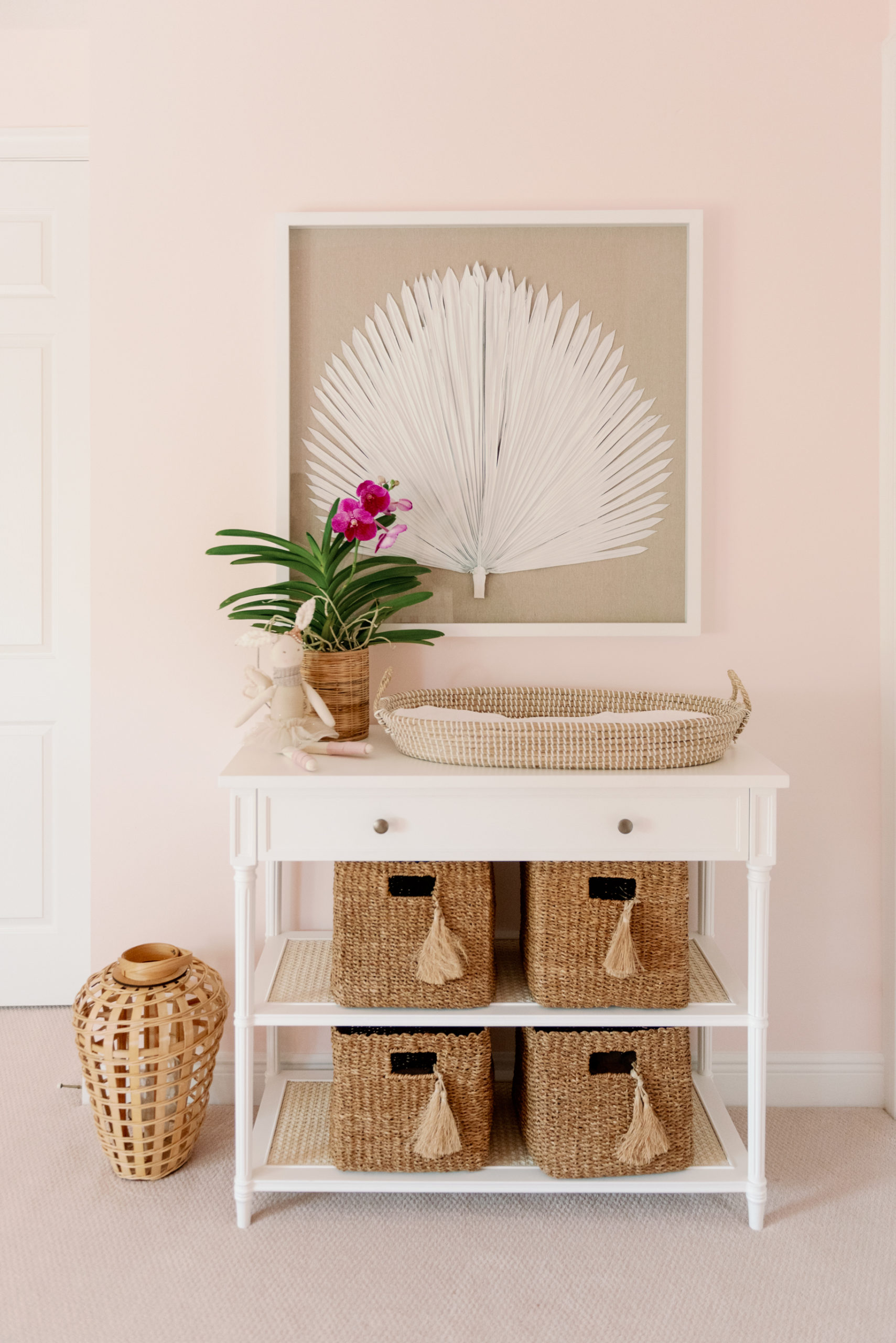 Framed Palm Art Over Changing Table with Storage Baskets